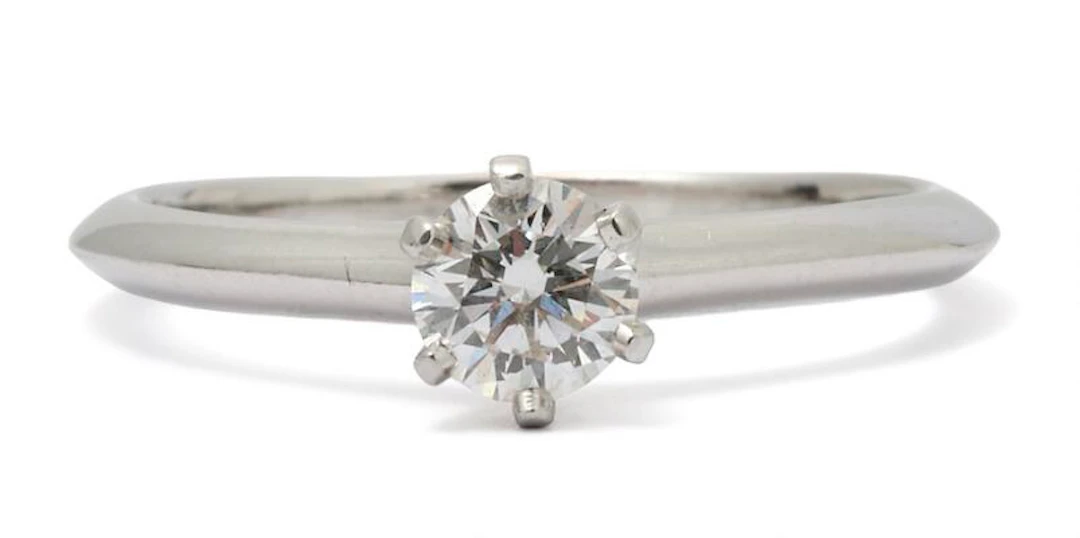 Tiffany & Co.: A "The Tiffany® Setting" solitaire diamond ring, mounted