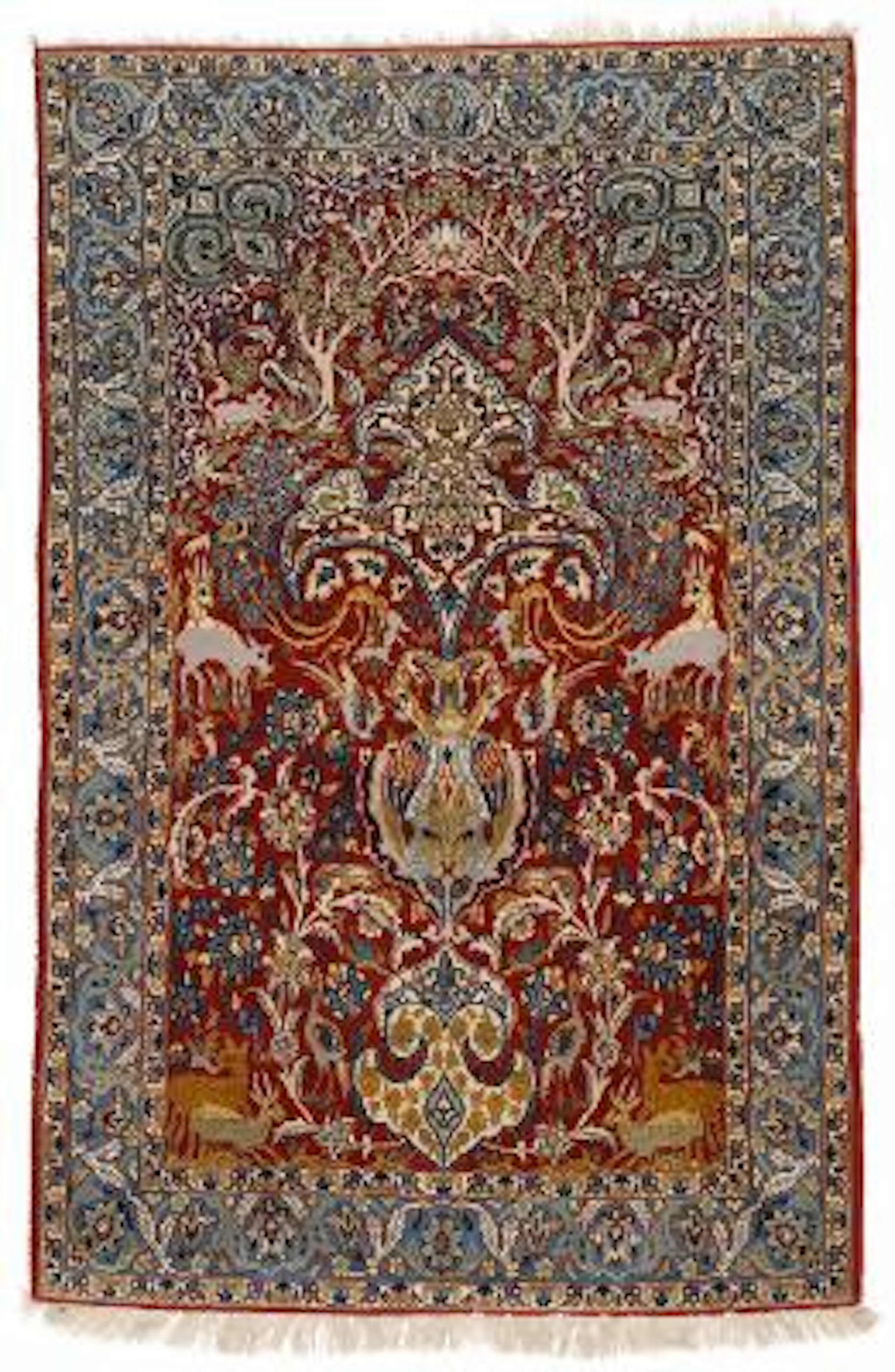 An Isfahan rug, Persia. Arch design with animal motifs. Knotted on