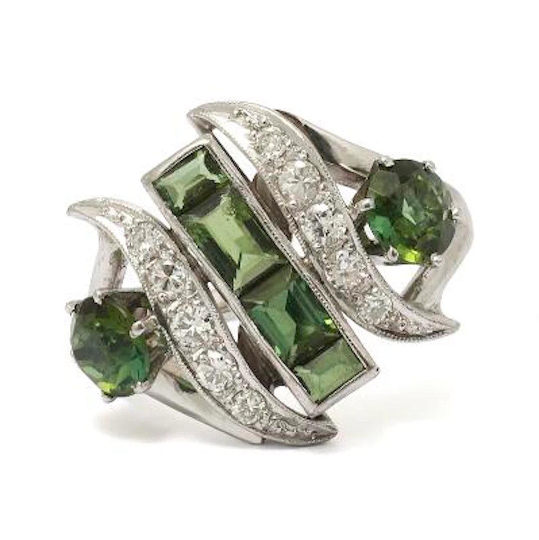 A tourmaline and diamond ring set with faceted tourmalines and diamonds