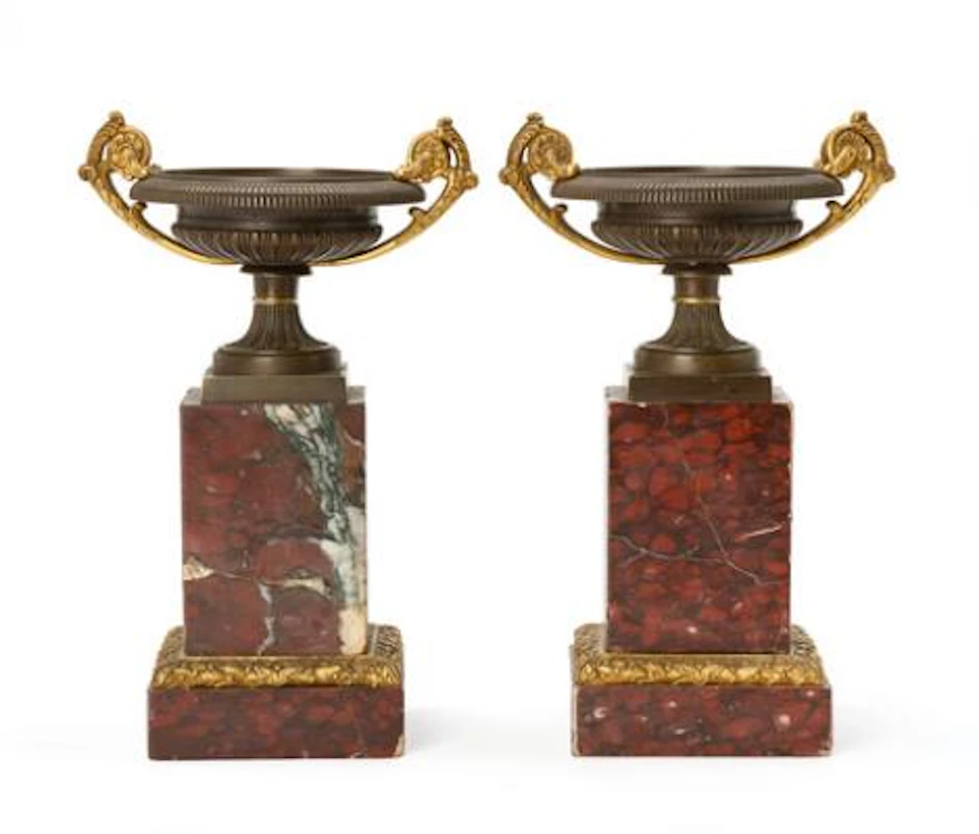 A pair of French 19th century bronze and marble tazzi. H. 27 cm. (2)