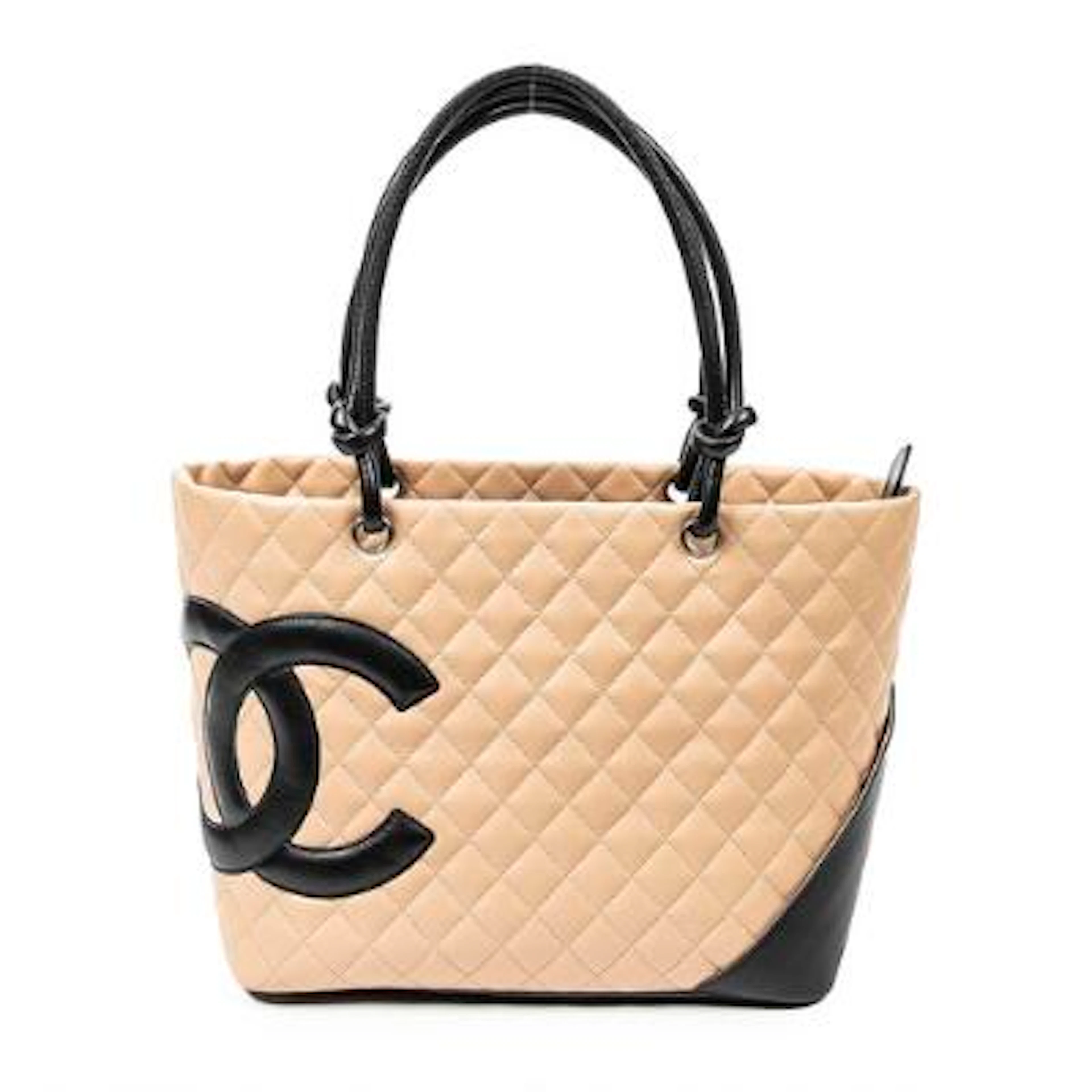 Chanel: A "Cambon Ligne Tote" bag in beige quilted leather with black
