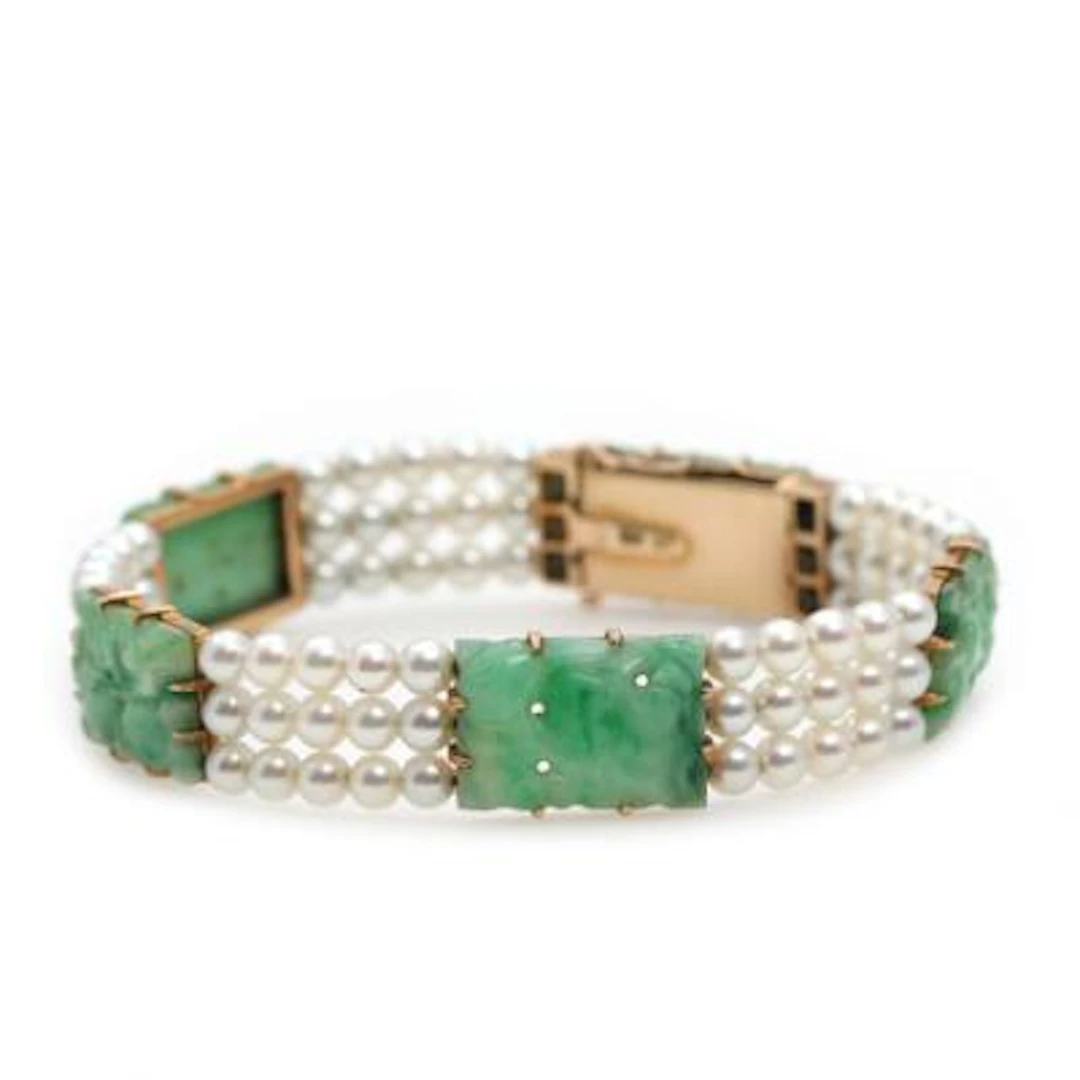 Laurits Berth: An Art Deco jade and pearl bracelet, mounted in 14k