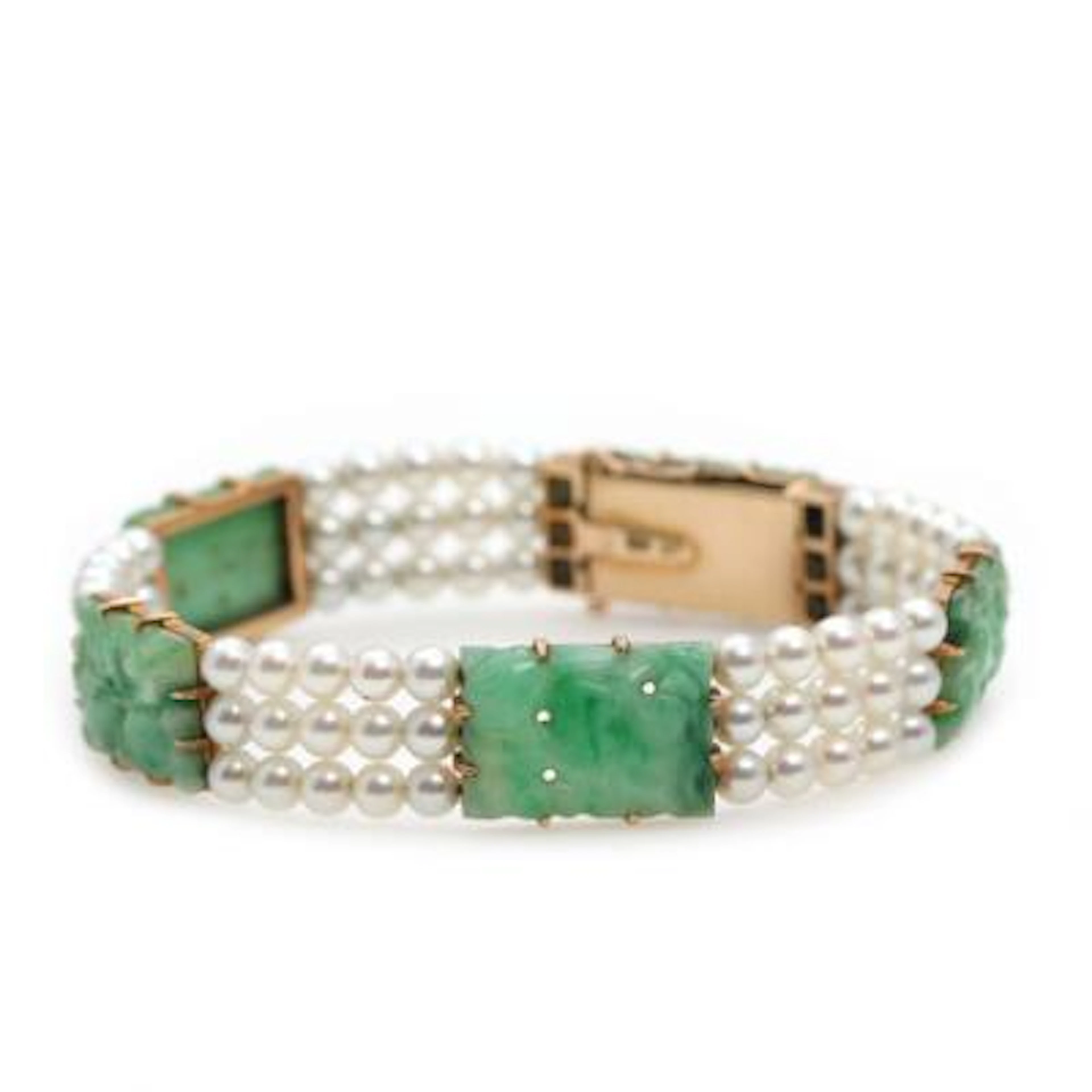 Laurits Berth: An Art Deco jade and pearl bracelet, mounted in 14k
