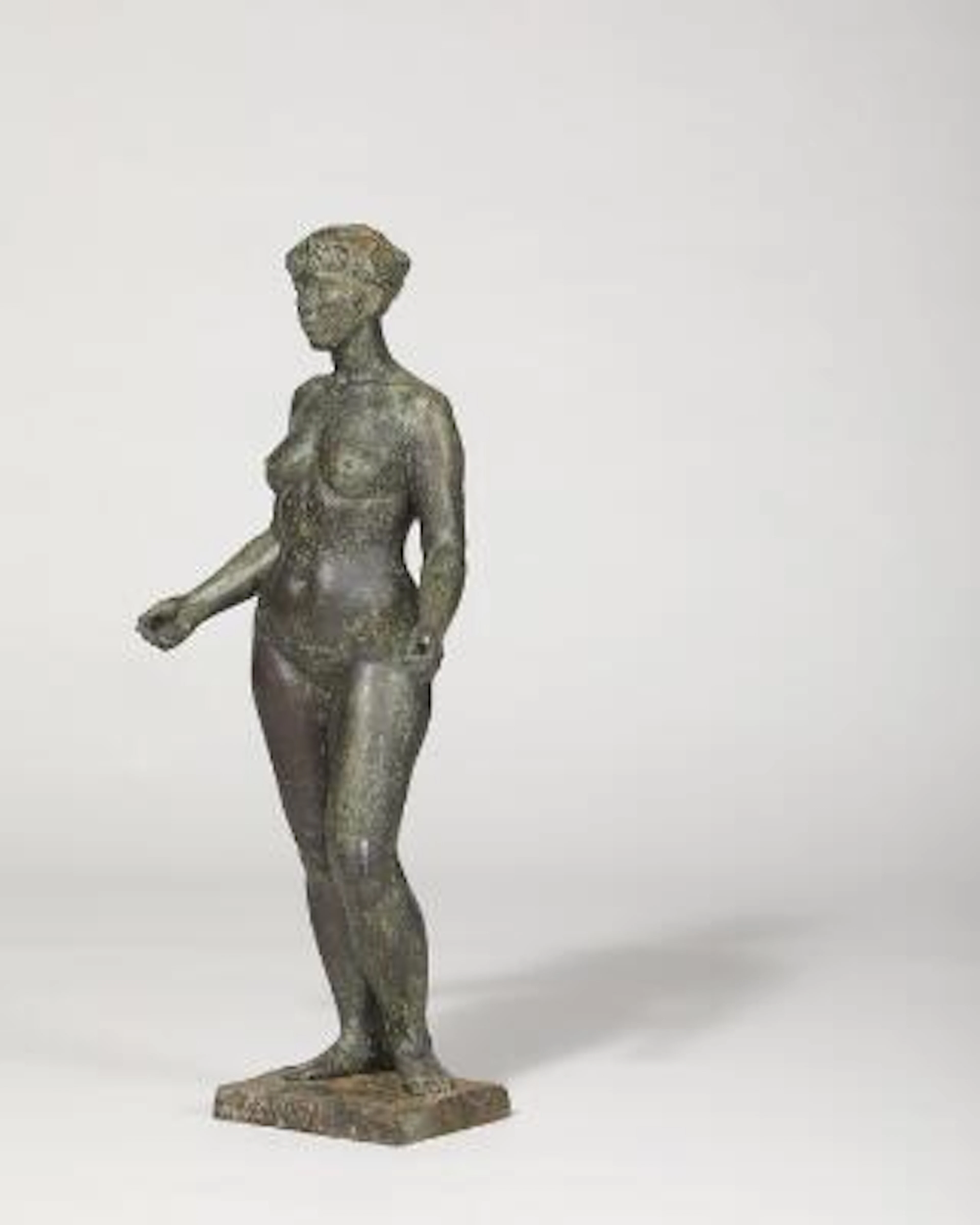 Emil Lie: A standing naked woman. Signed Lie. Patinated bronze. Manufactured
