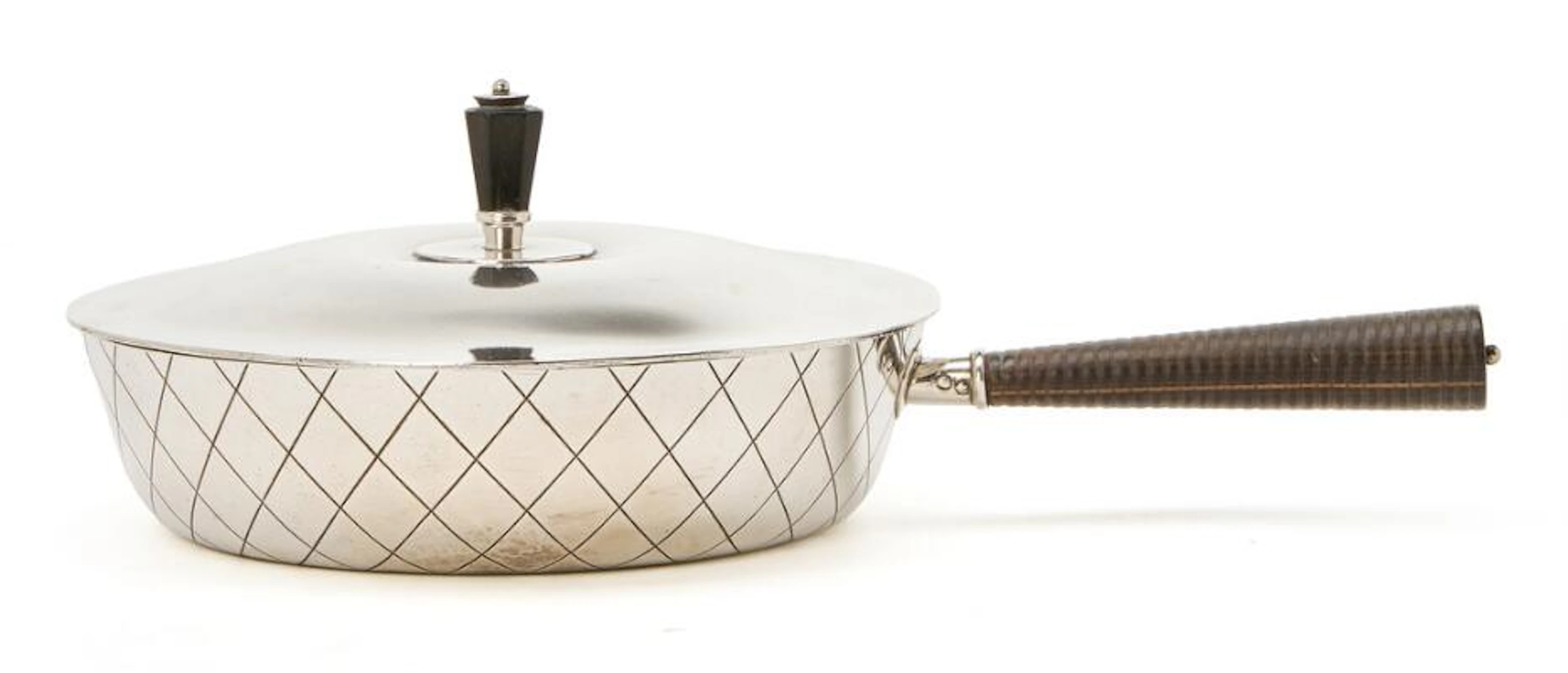 Sigvard Bernadotte: A sterling silver dish with engraved harlequin