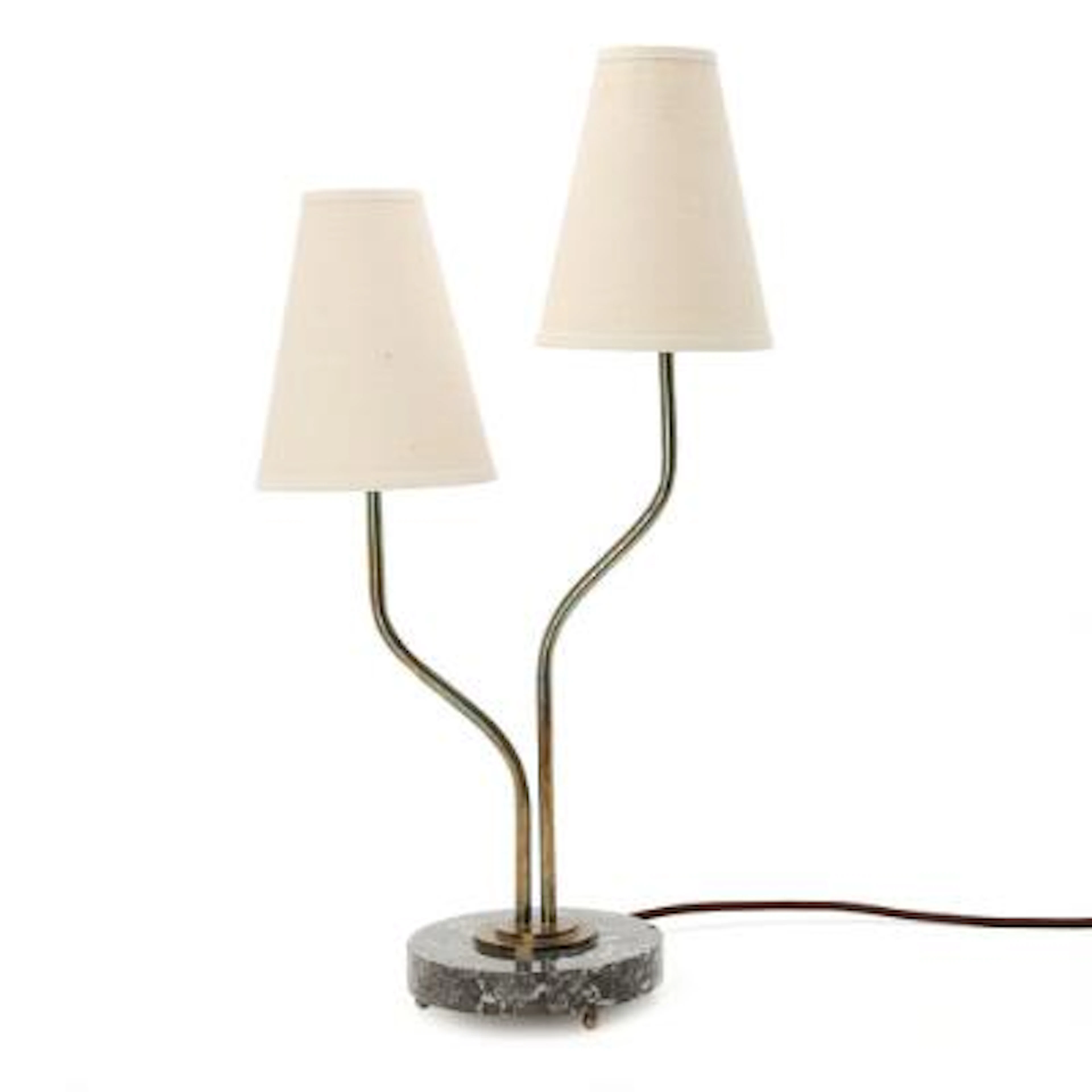 Swedish design: A patinated brass table lamp on greyish granite base.