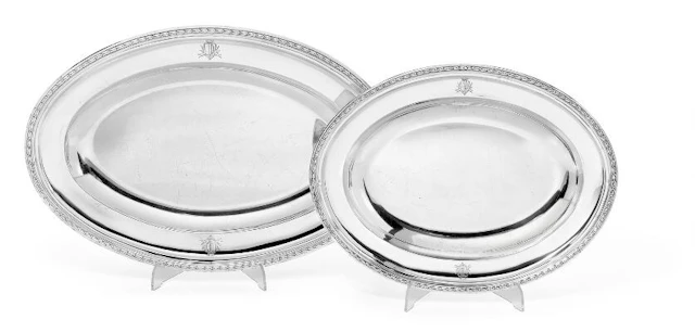 Italian silversmith, first half-19th century: Two oval silver serving