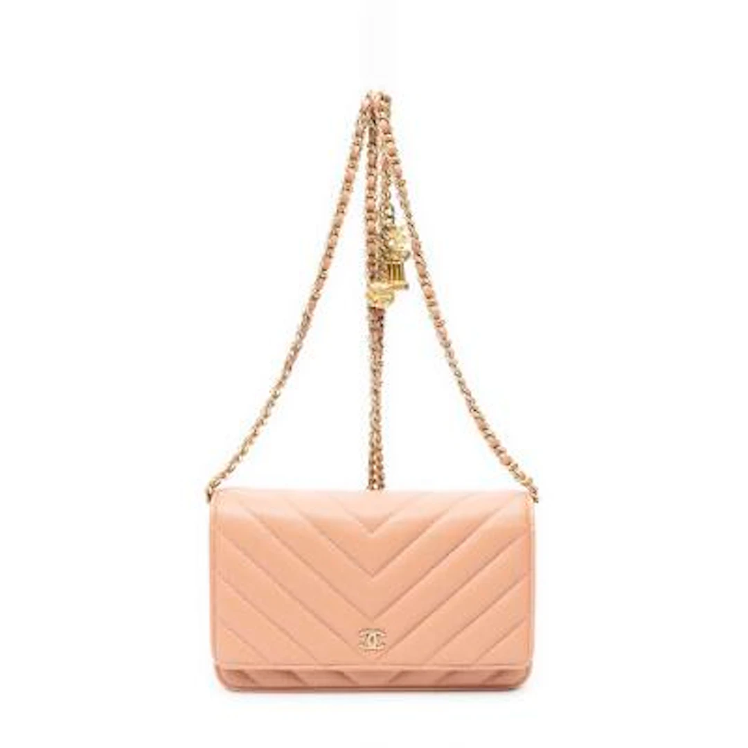 Chanel: An "Ancient Greek Charms Wallet on Chain" in salmon-coloured