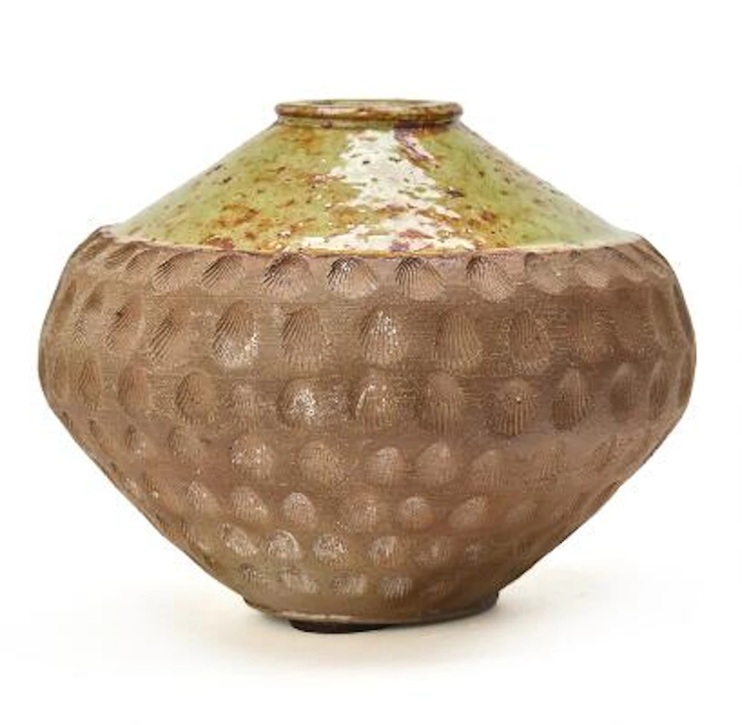 Lisbeth Munch-Petersen: A small earthenware vase modelled with incised