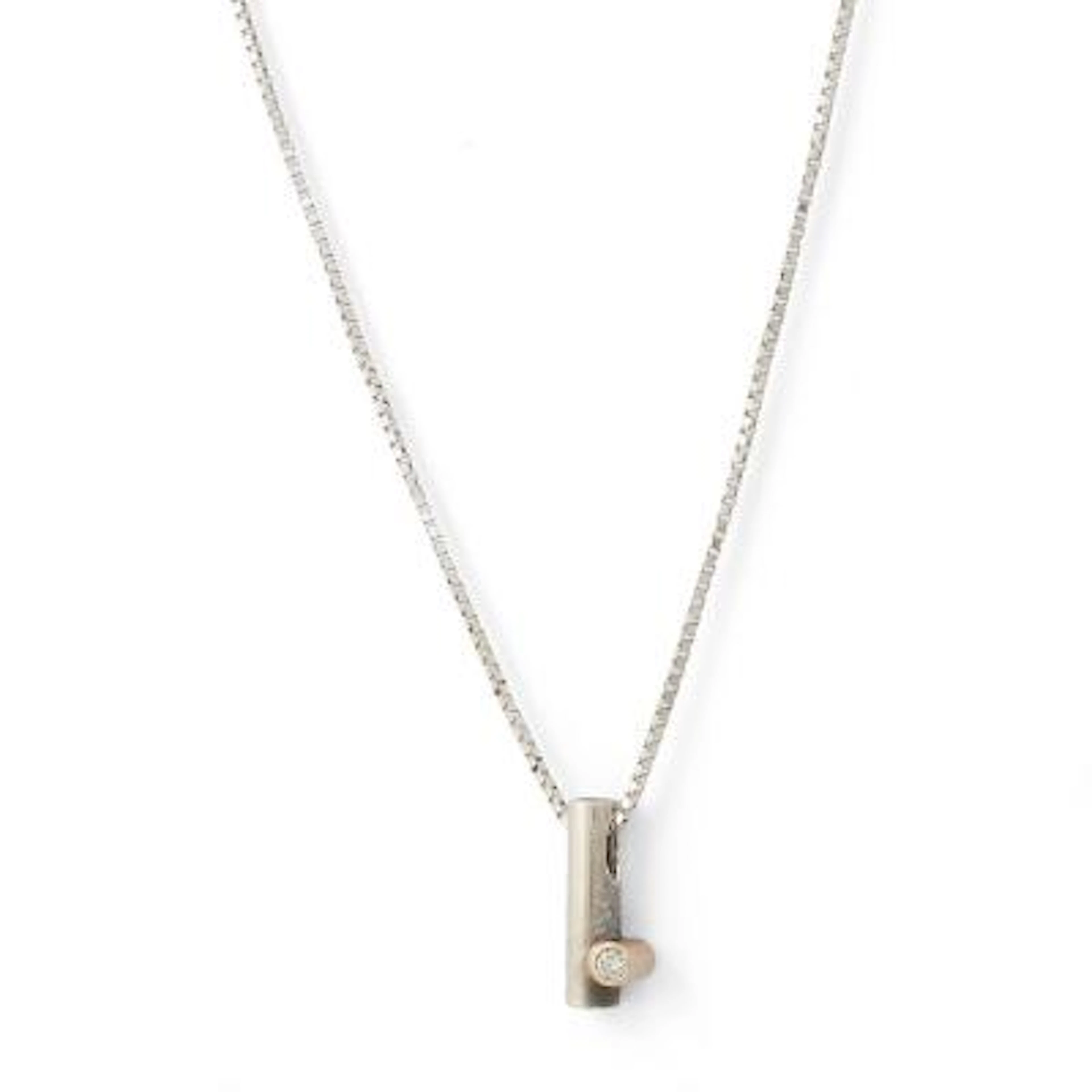 A diamond necklace and pendant set with a diamond, mounted in silver