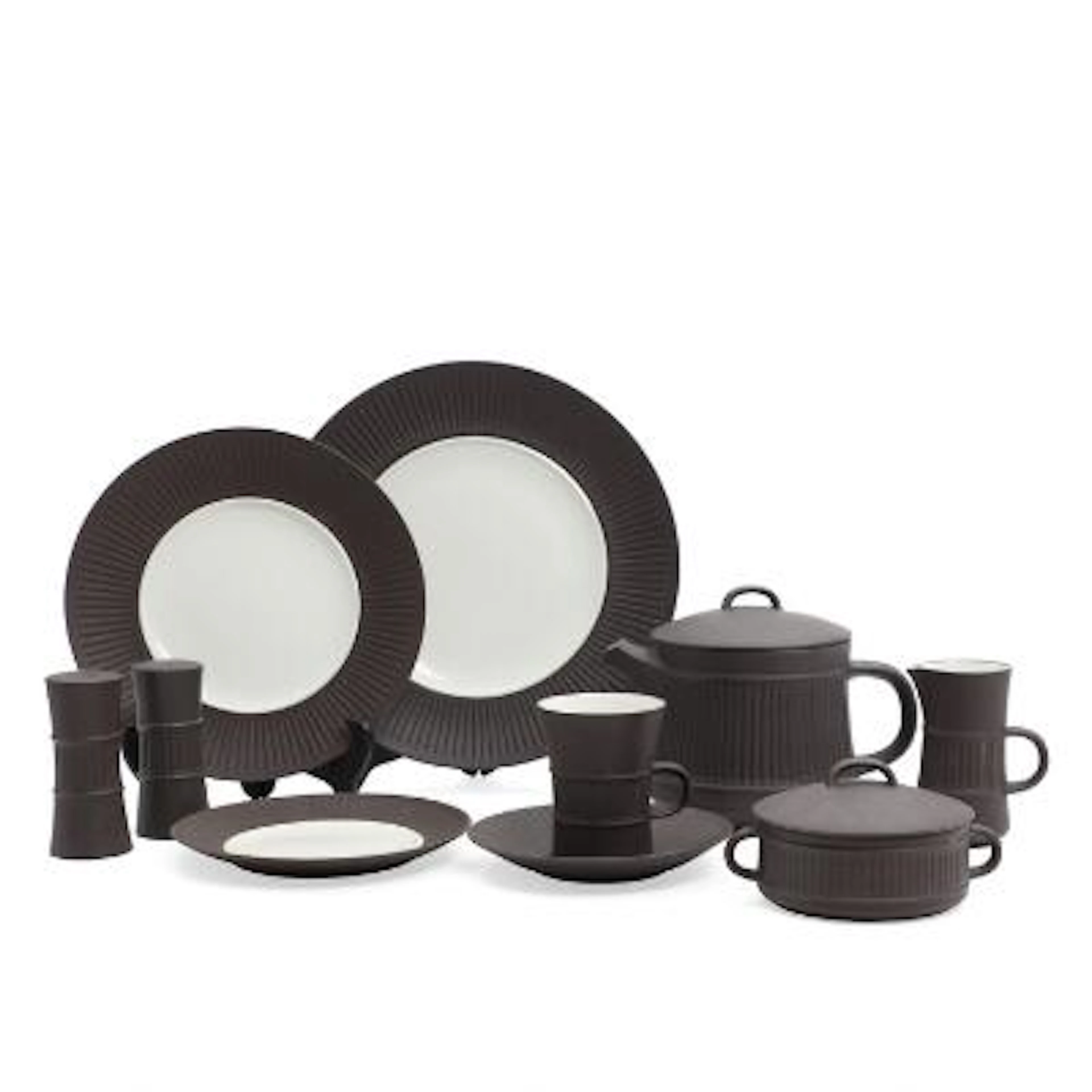 "Flamestone". Parts of a coffee and dinner service of unglazed brown