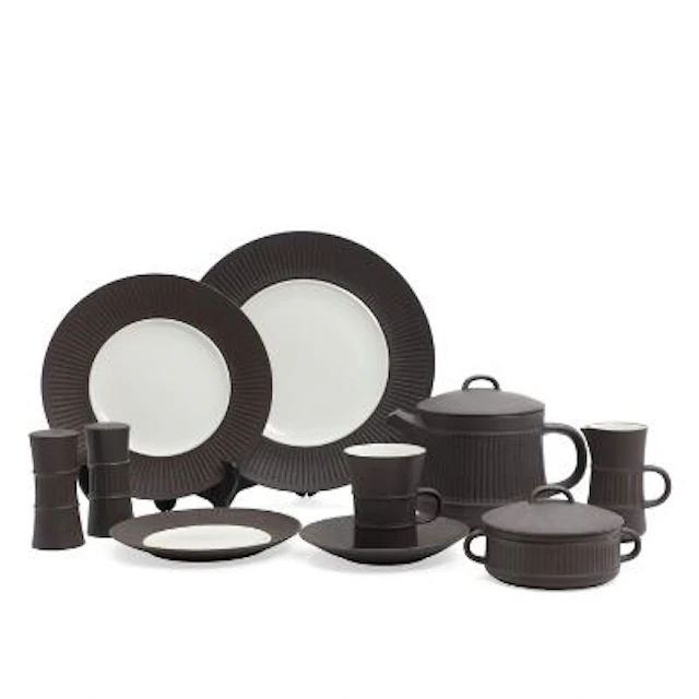 "Flamestone". Parts of a coffee and dinner service of unglazed brown
