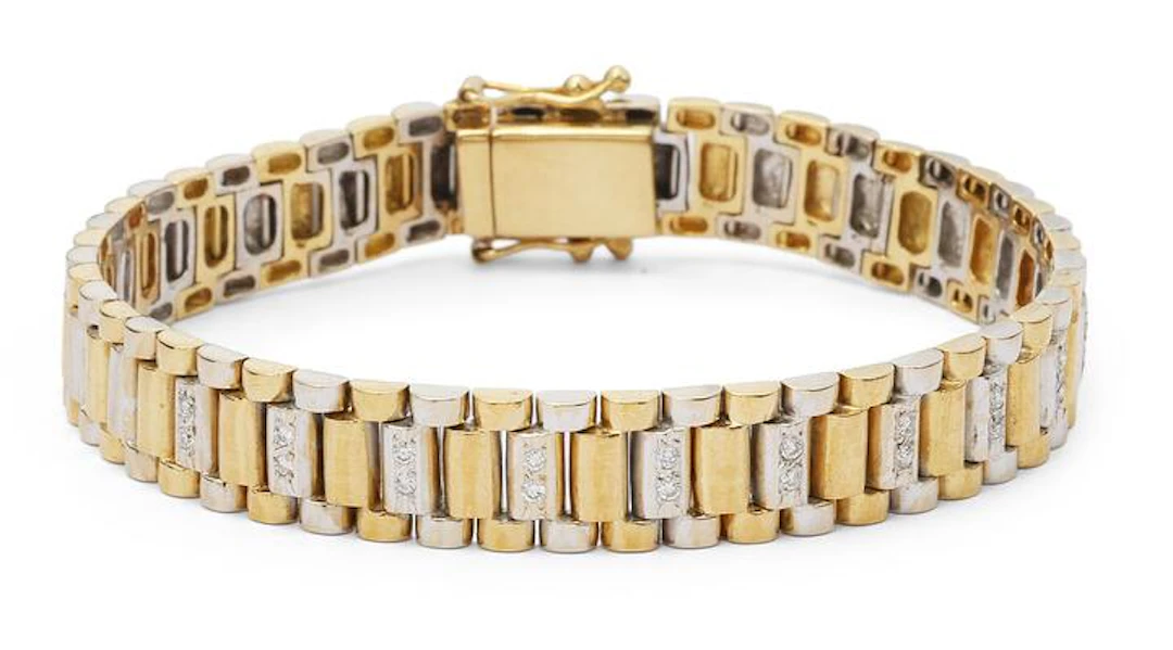 A diamond bracelet set with diamonds, mounted in 18k gold and white