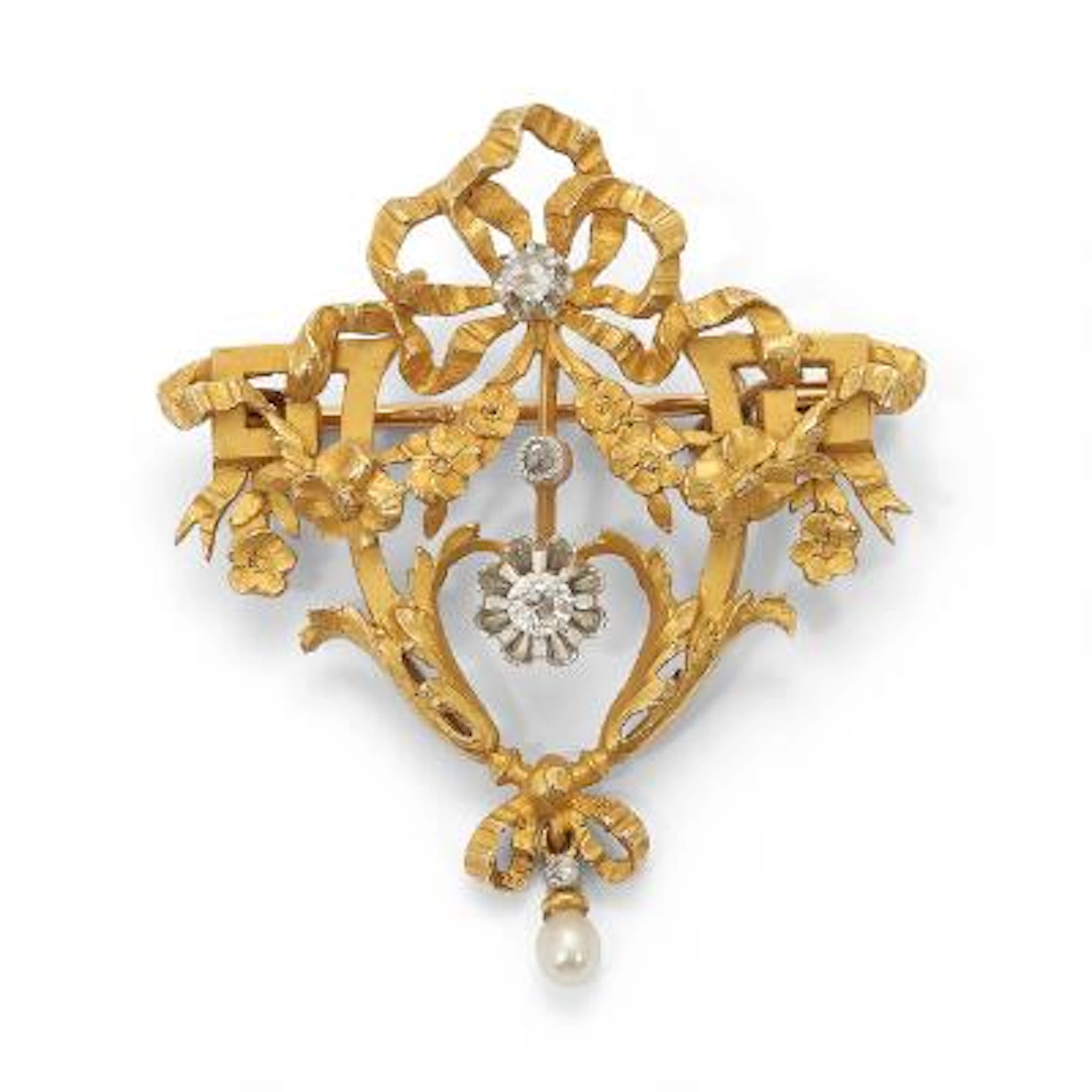 A Belle Epoque diamond brooch set with four diamonds and a pearl