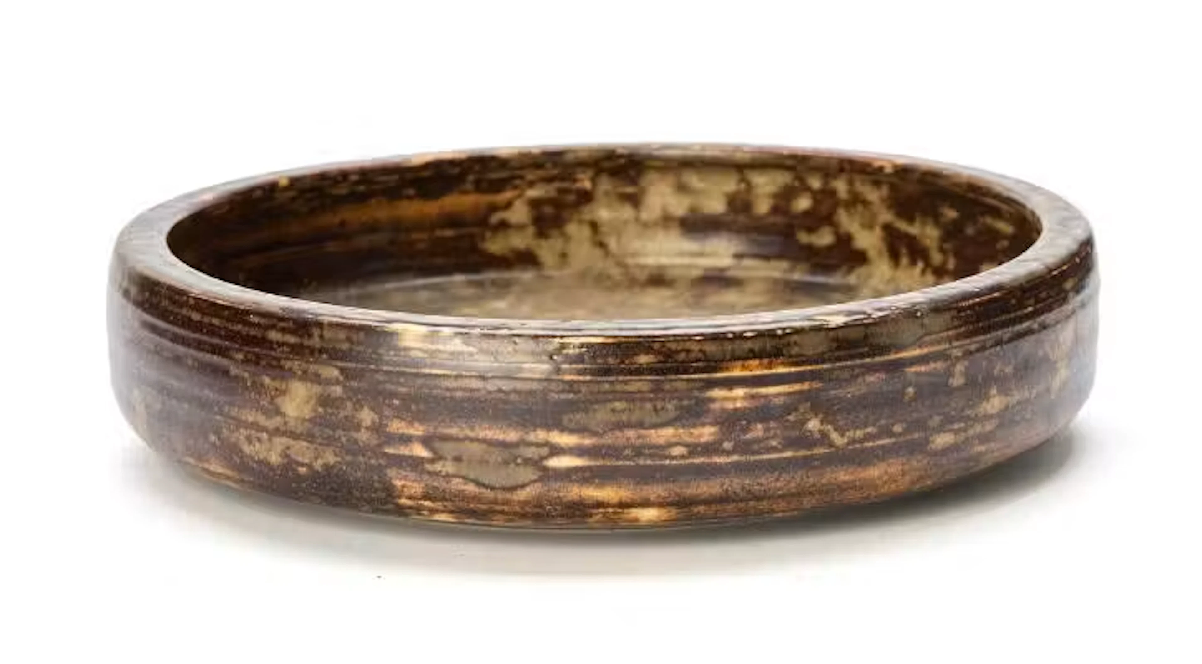 Patrick Nordström: A large stoneware bowl decorated with brown and