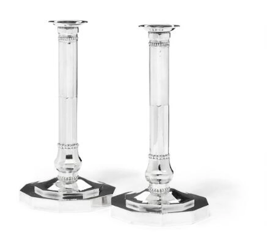 Johan Rohde: A pair of sterling silver candlesticks with hammered
