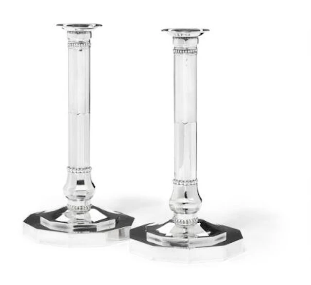 Johan Rohde: A pair of sterling silver candlesticks with hammered