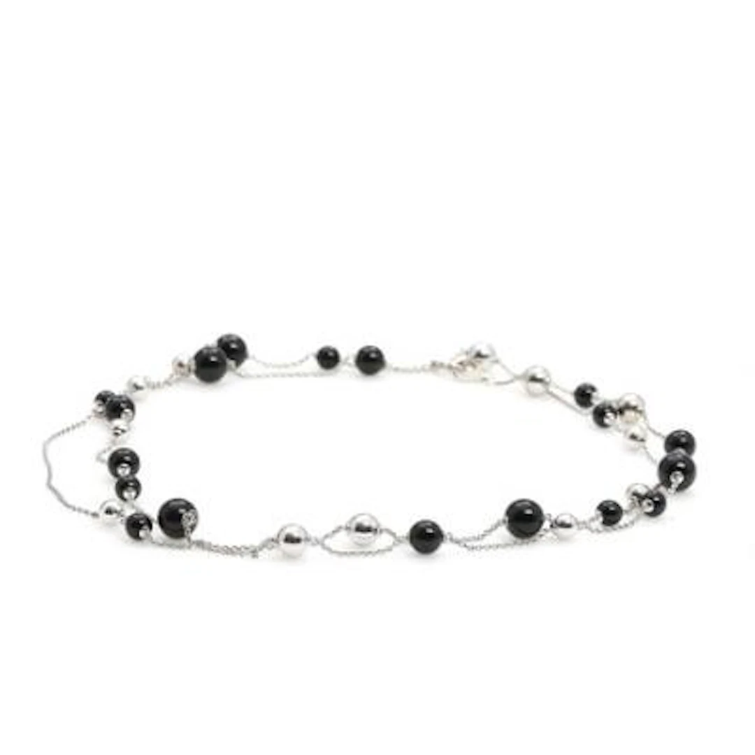 Regitze Overgaard: A "Sphere" onyx necklace set with onyx beads, mounted