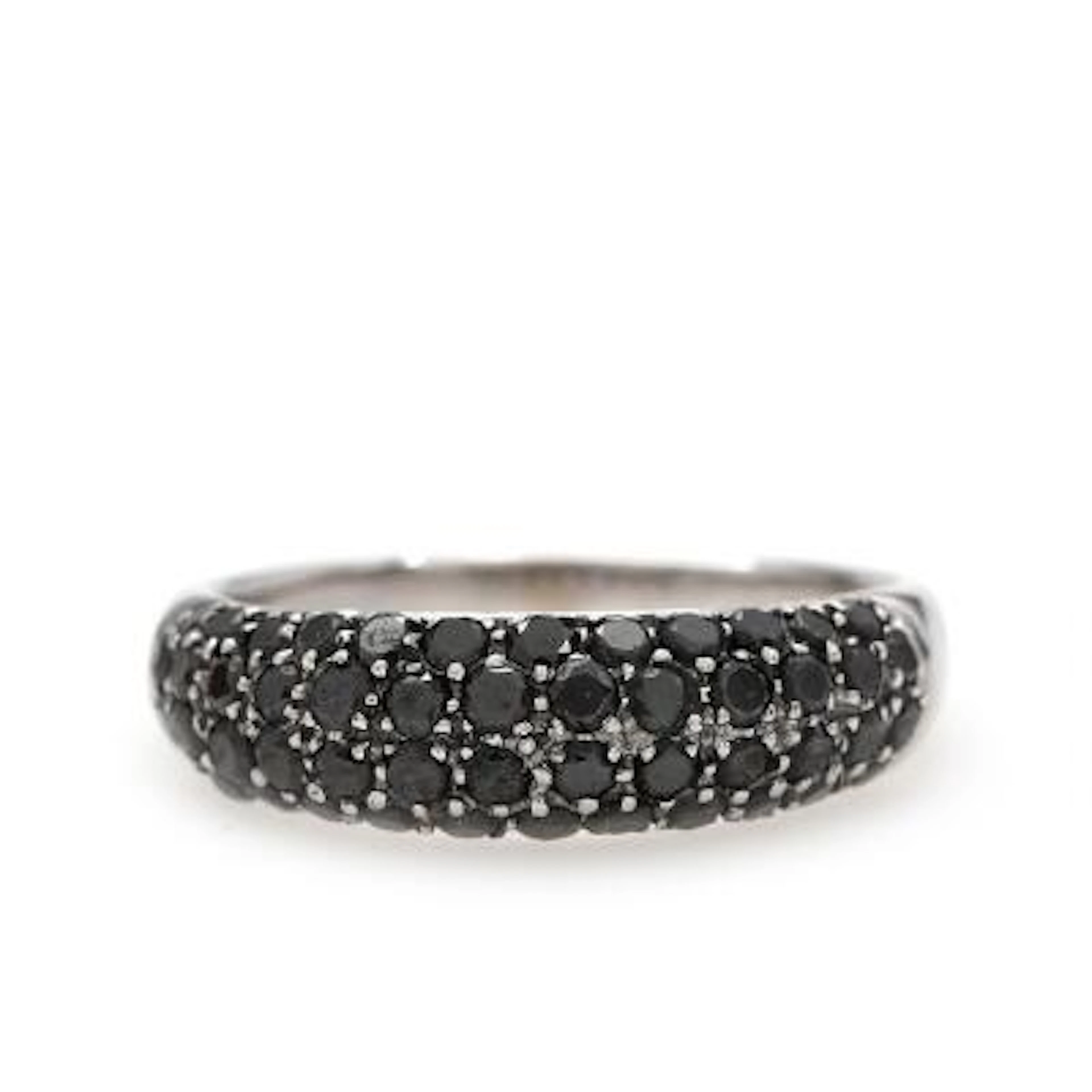 A diamond ring set with numerous brilliant-cut, black diamonds weighing