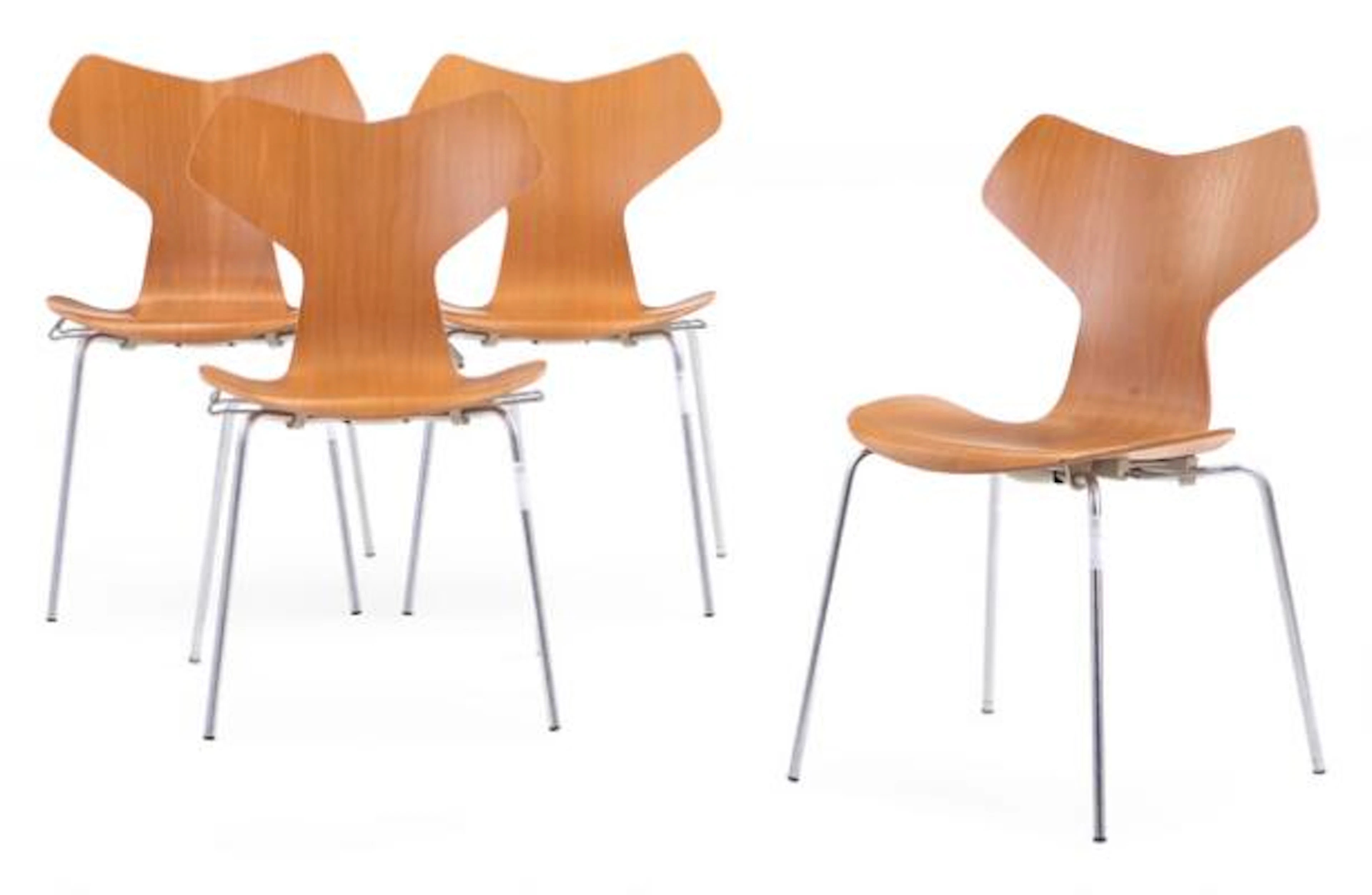 Arne Jacobsen: “Grand Prix”. A set of four dining chairs with chromed