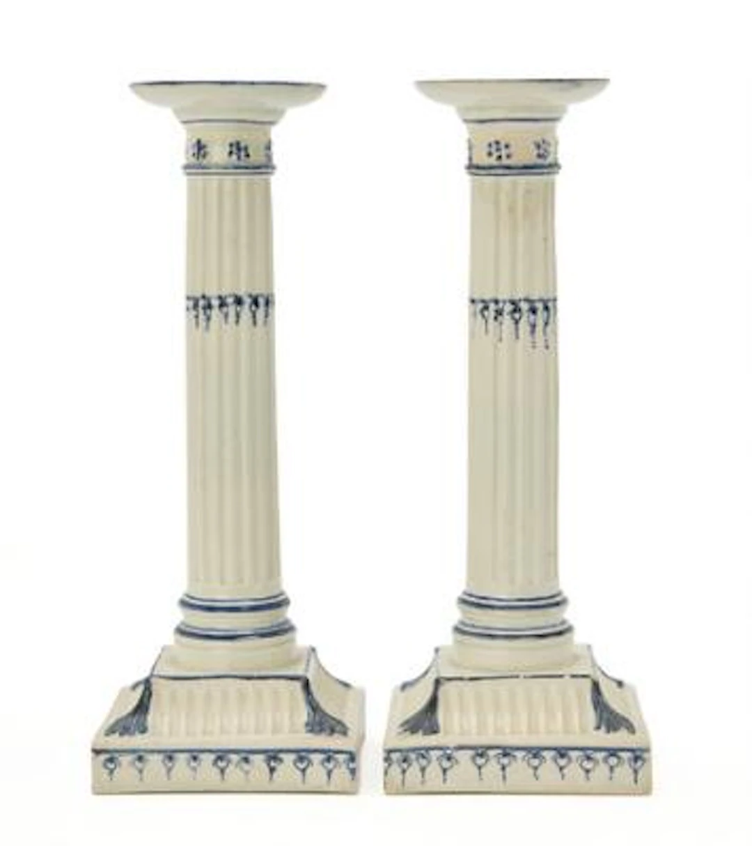 A pair of English Wedgwood candlesticks of creamware. 18th century.