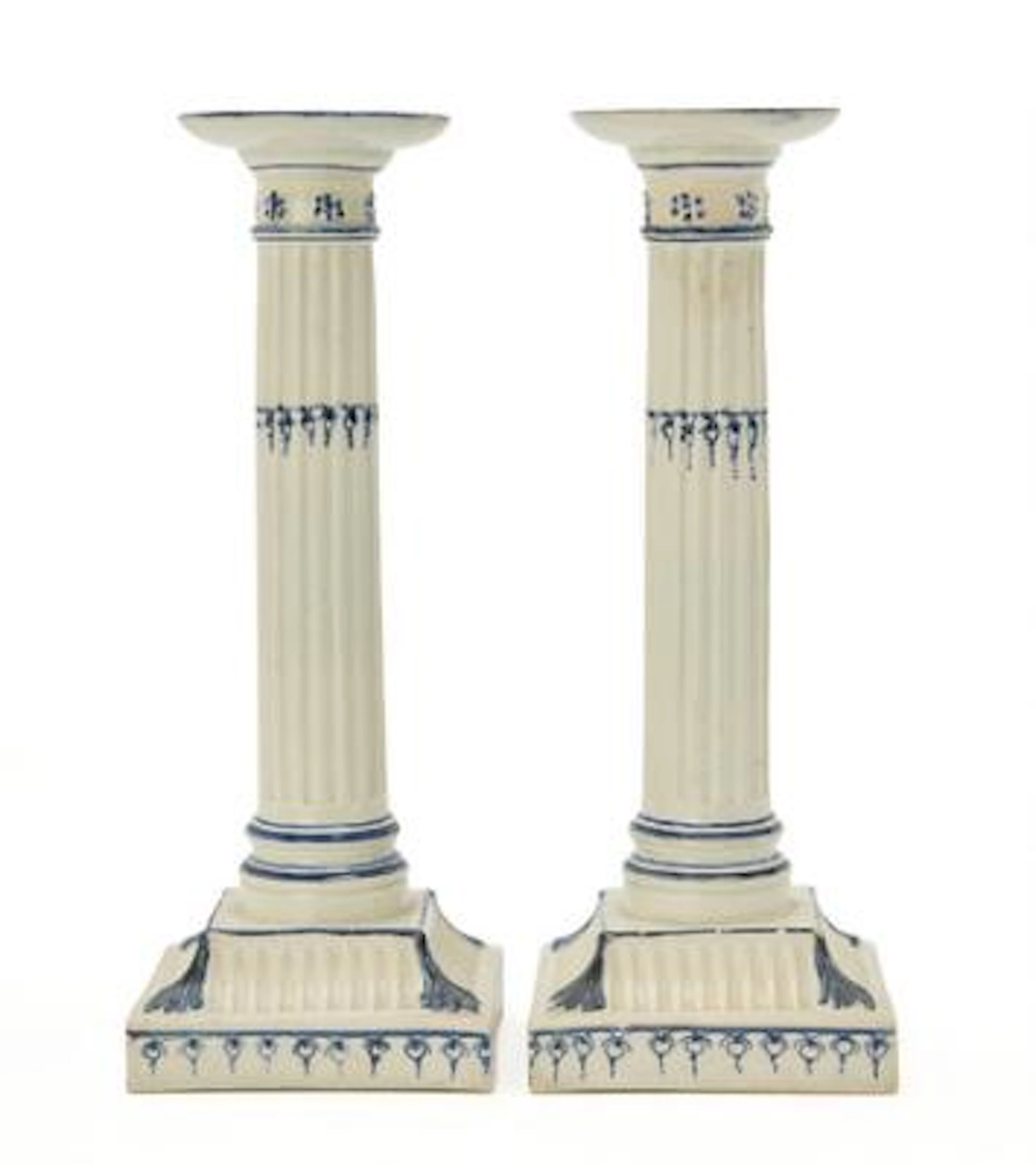A pair of English Wedgwood candlesticks of creamware. 18th century.