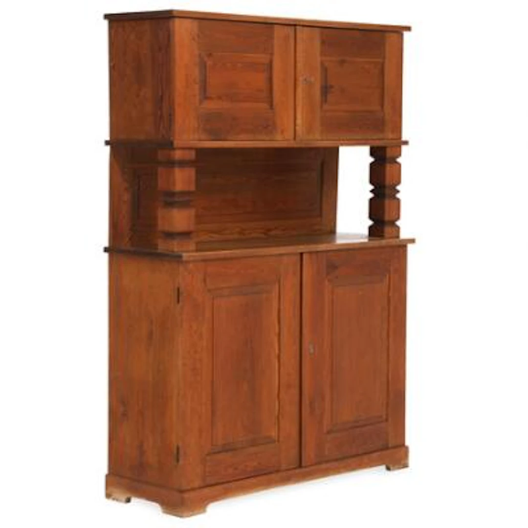 Swedish design: "Sportstuga". Patinated pine cabinet. Front with four