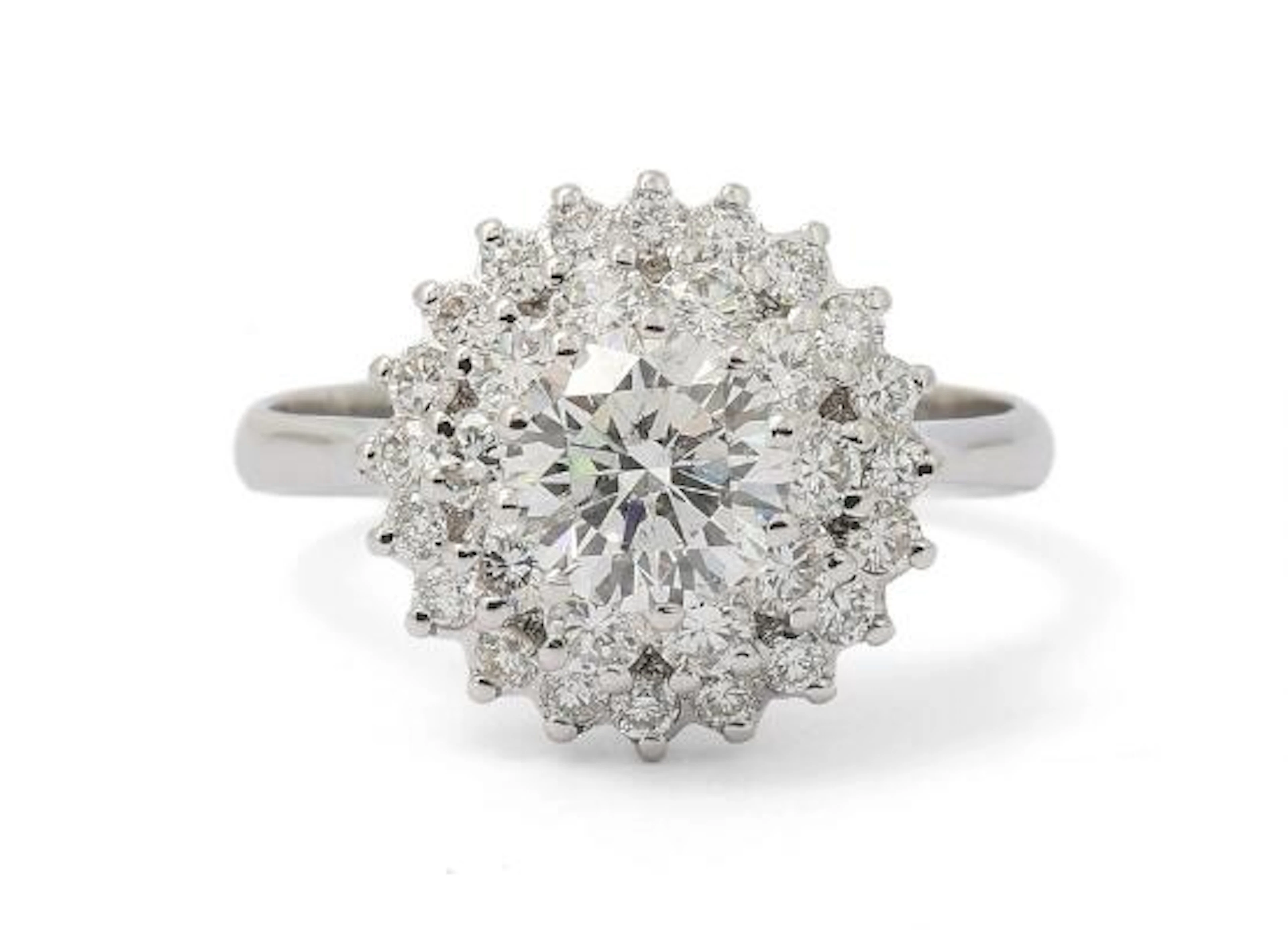A diamond ring set with numerous brilliant-cut diamonds mounted in