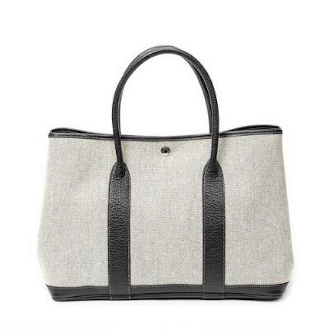 Hermès: A "Garden Party" bag of grey Toile H-canvas with black leather