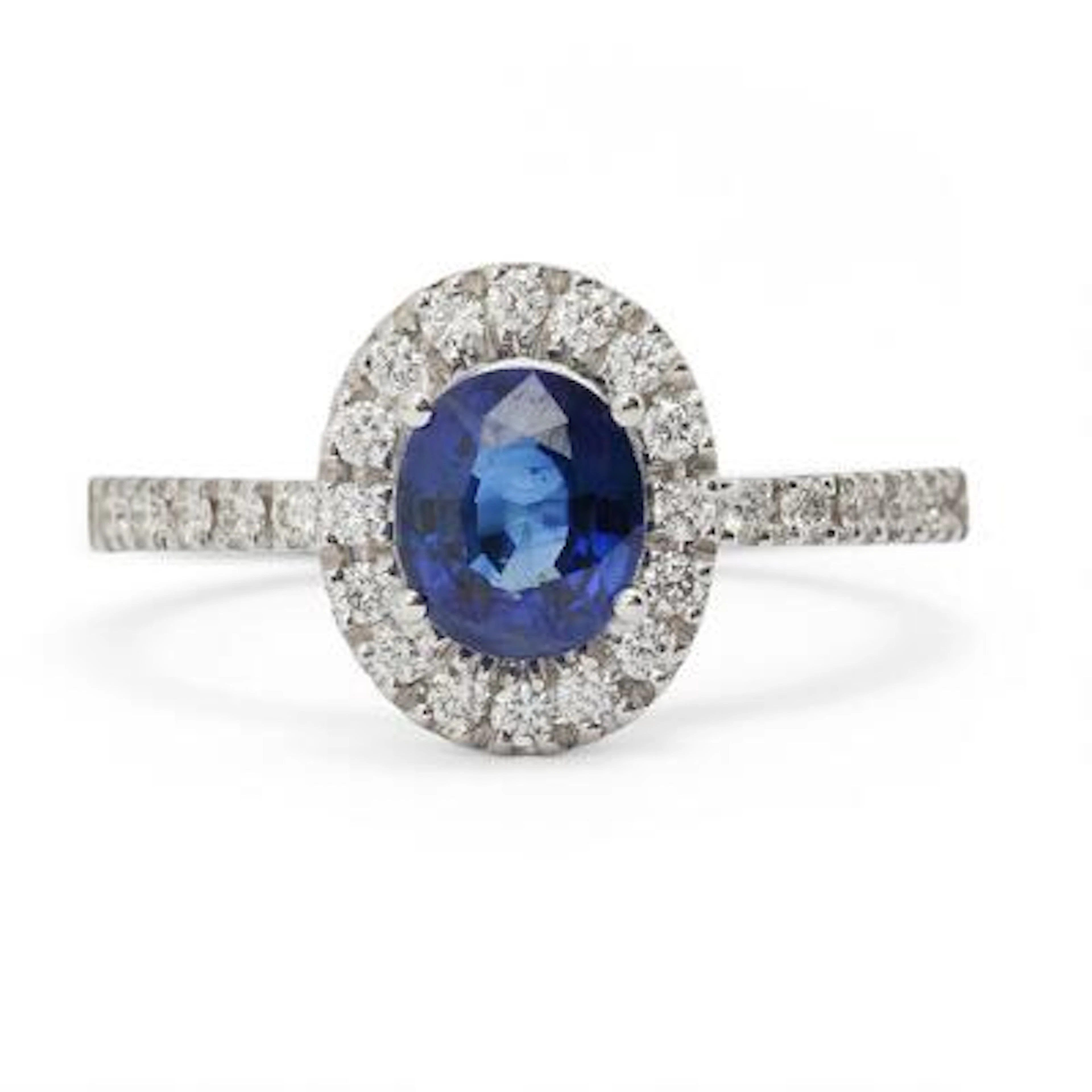 A sapphire and diamond ring set with sapphire and diamonds mounted