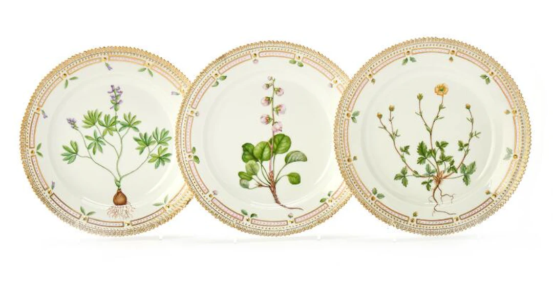 'Flora Danica' three enamelled and gilt porcelain lunch plates. Royal