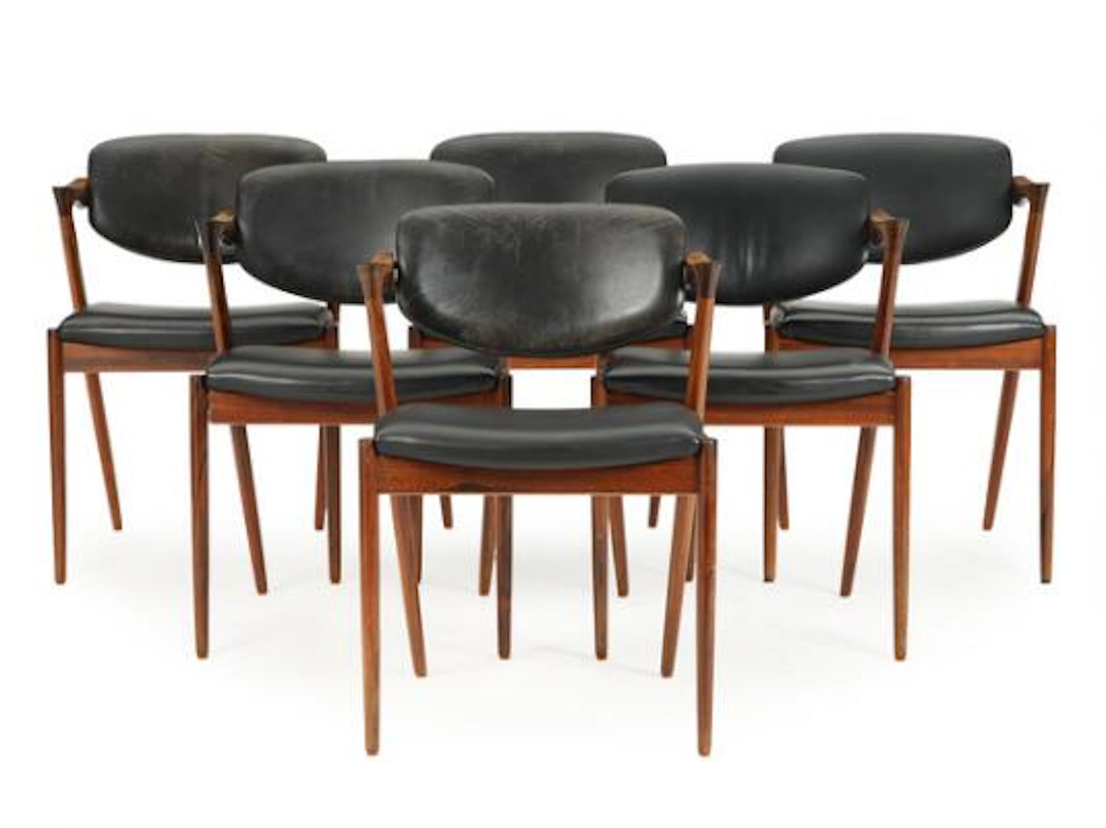 Kai Kristiansen: Six armchairs with rosewood frame. Seat and tilt-back