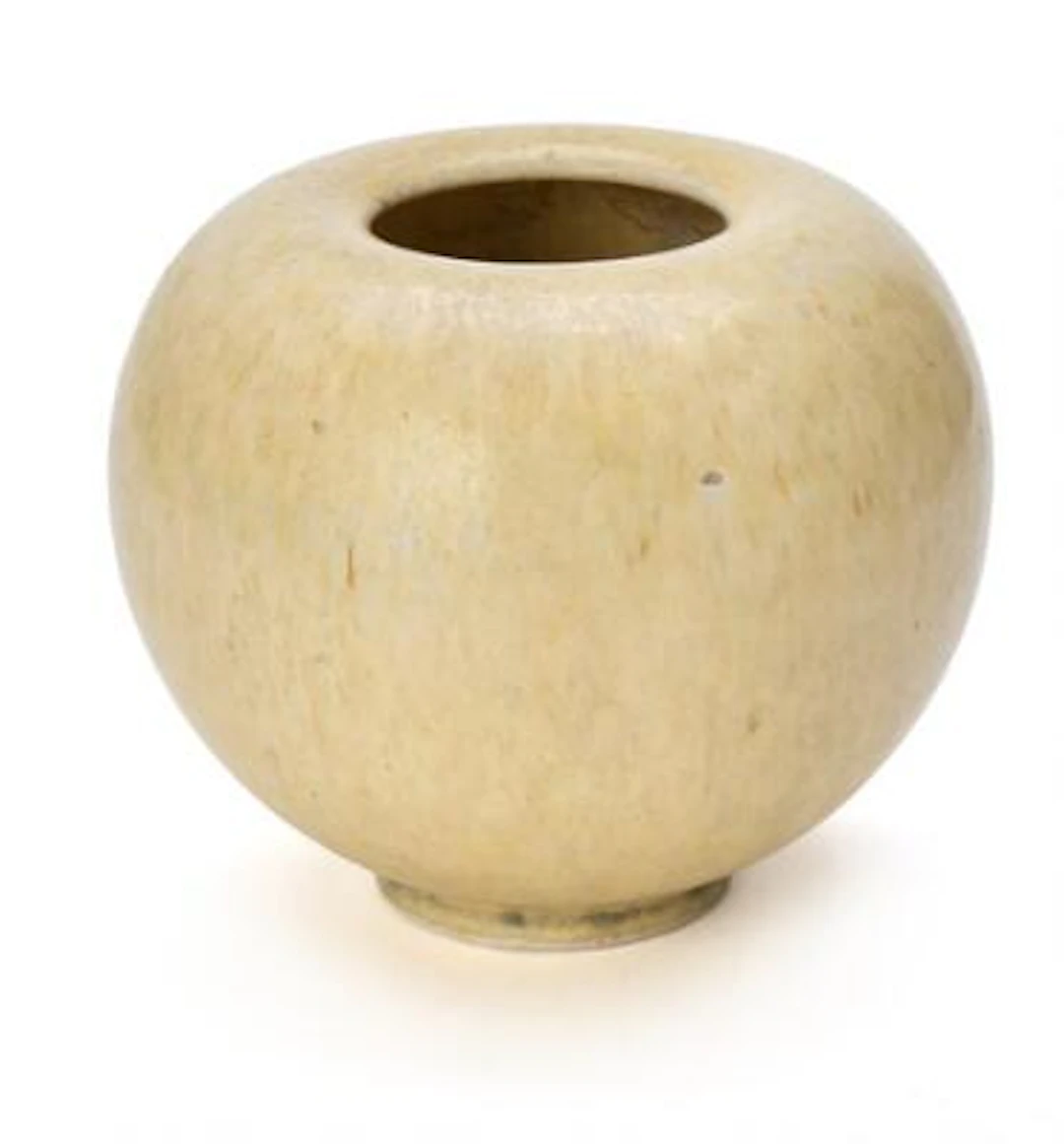 Eva Stæhr-Nielsen: A small, round stoneware vase decorated with light