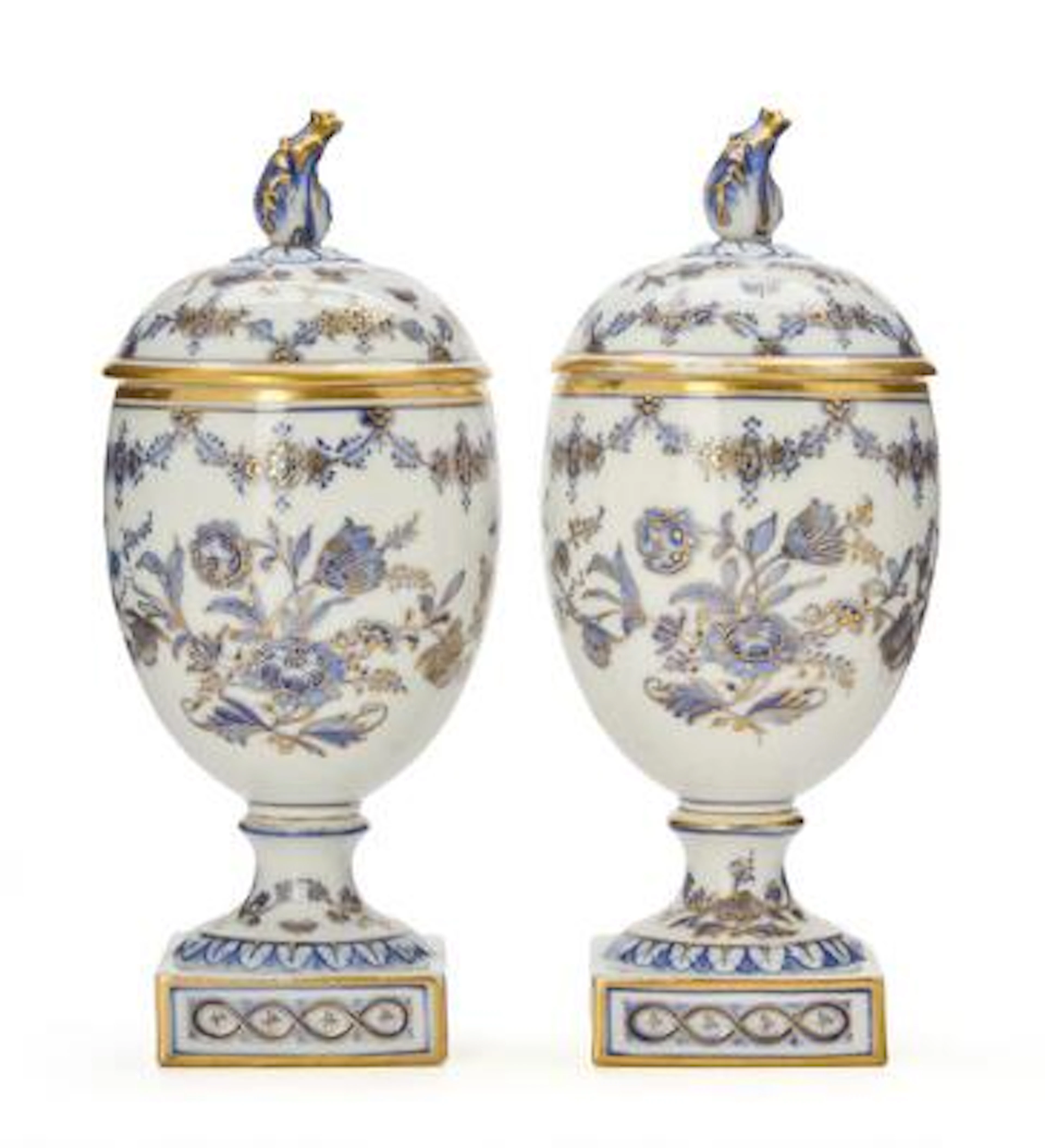A pair of lidded porcelain vases, decorated in underglaze blue and