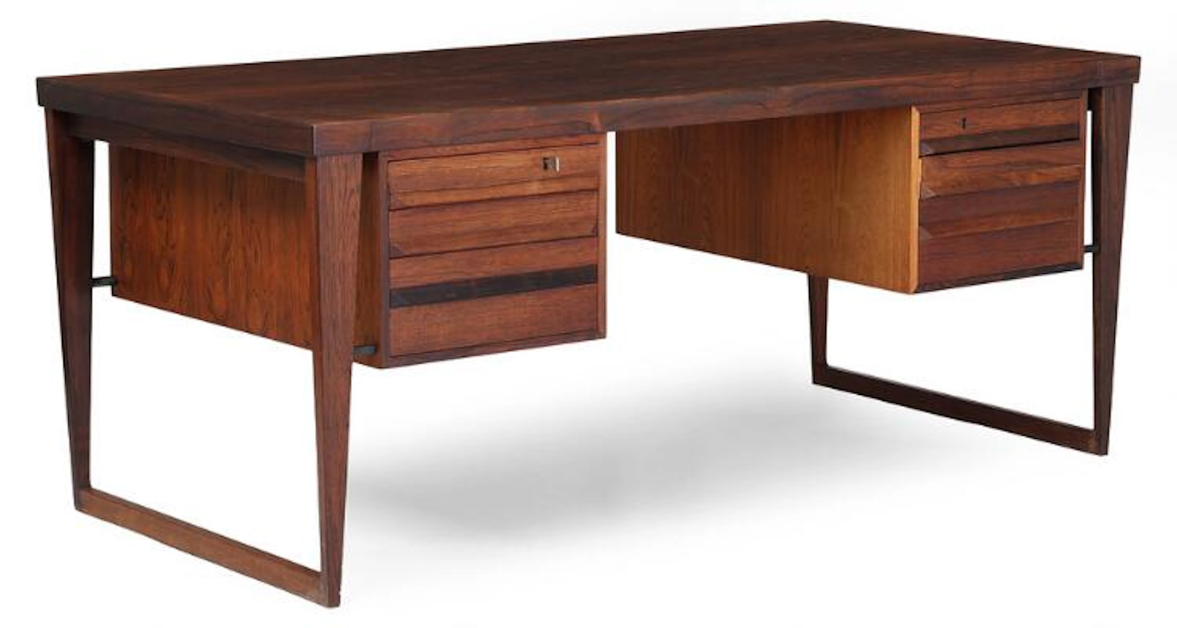 Kai Kristiansen: Rosewood desk with runner legs, front with three