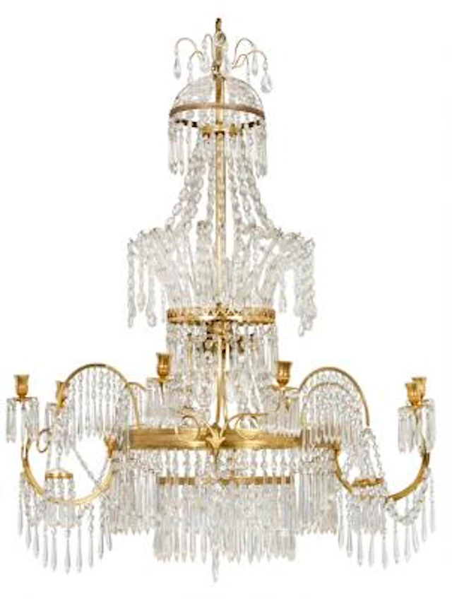 A north European gilt bronze, cut glass and crystal eight light chandelier
