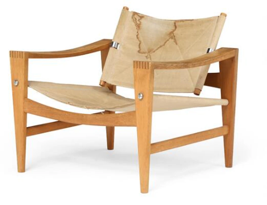 Hans J. Wegner: "Bukkestol". An oak easy chair with steel fittings.