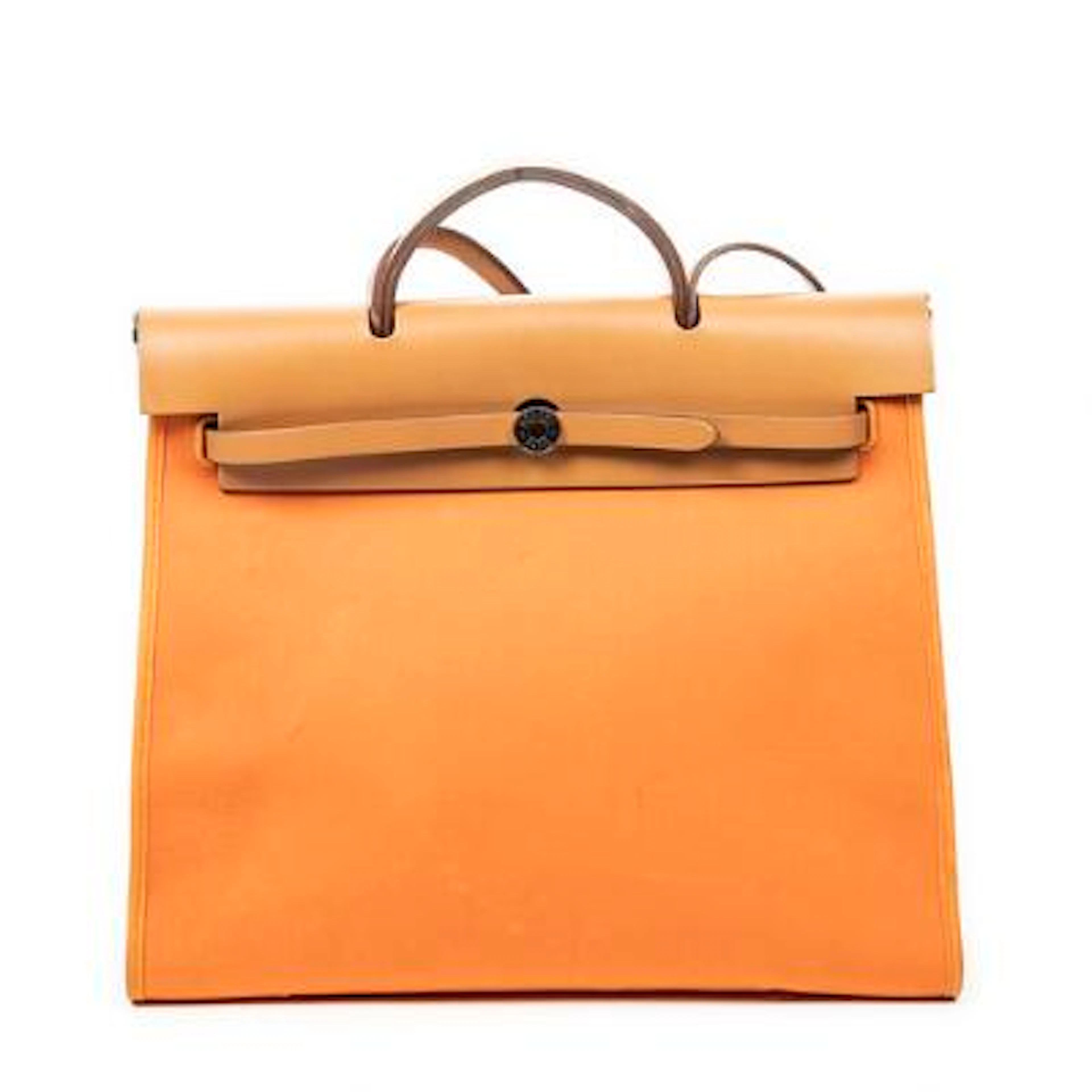 Hermès: "Herbag 39" in orange Toile Officier canvas with brown leather