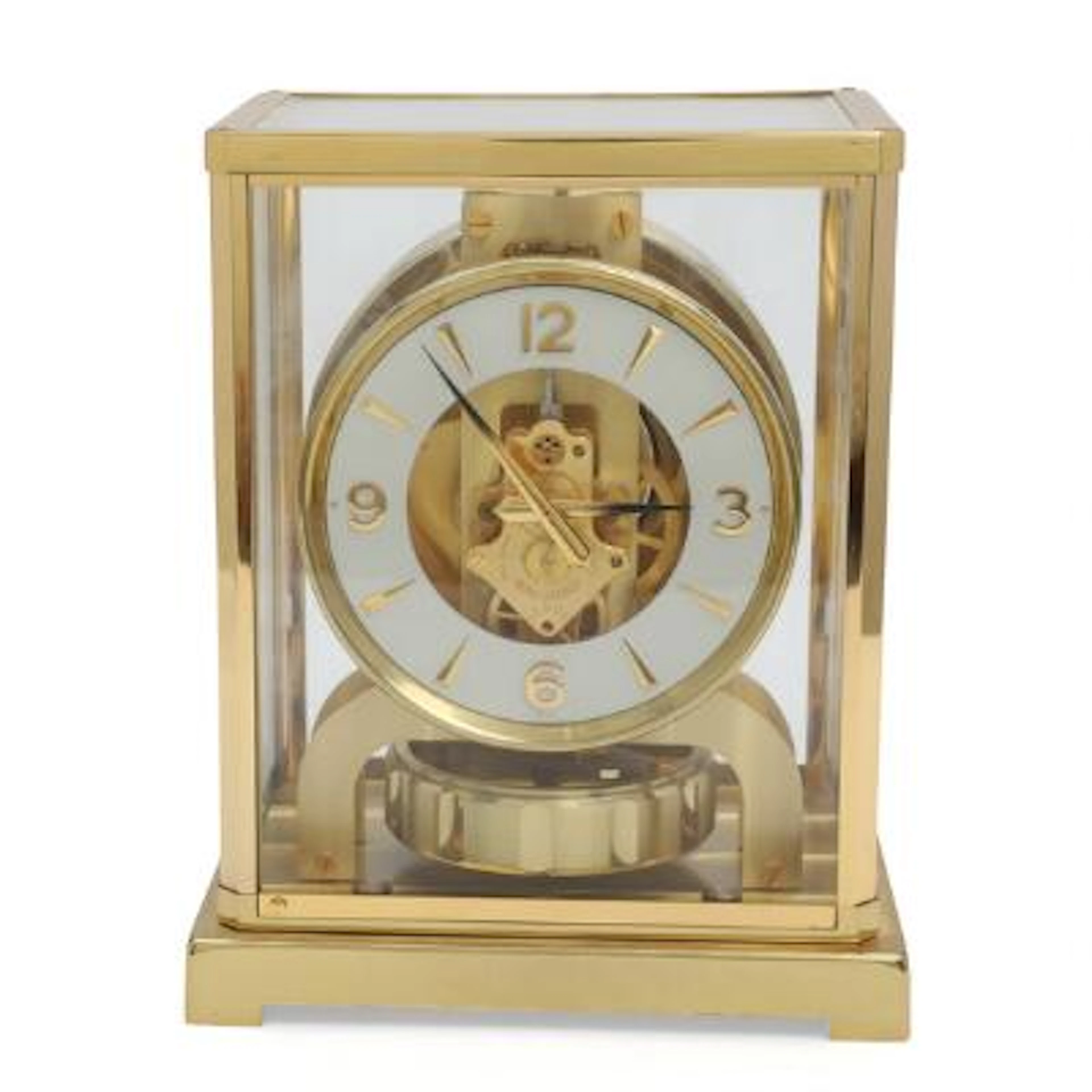 Jaeger-LeCoultre: "Atmos". A gilt brass and glass table clock with