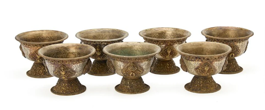 Seven metal butterlamps. Bhutan, 20th century. H. 8 cm. (7) – Bruun