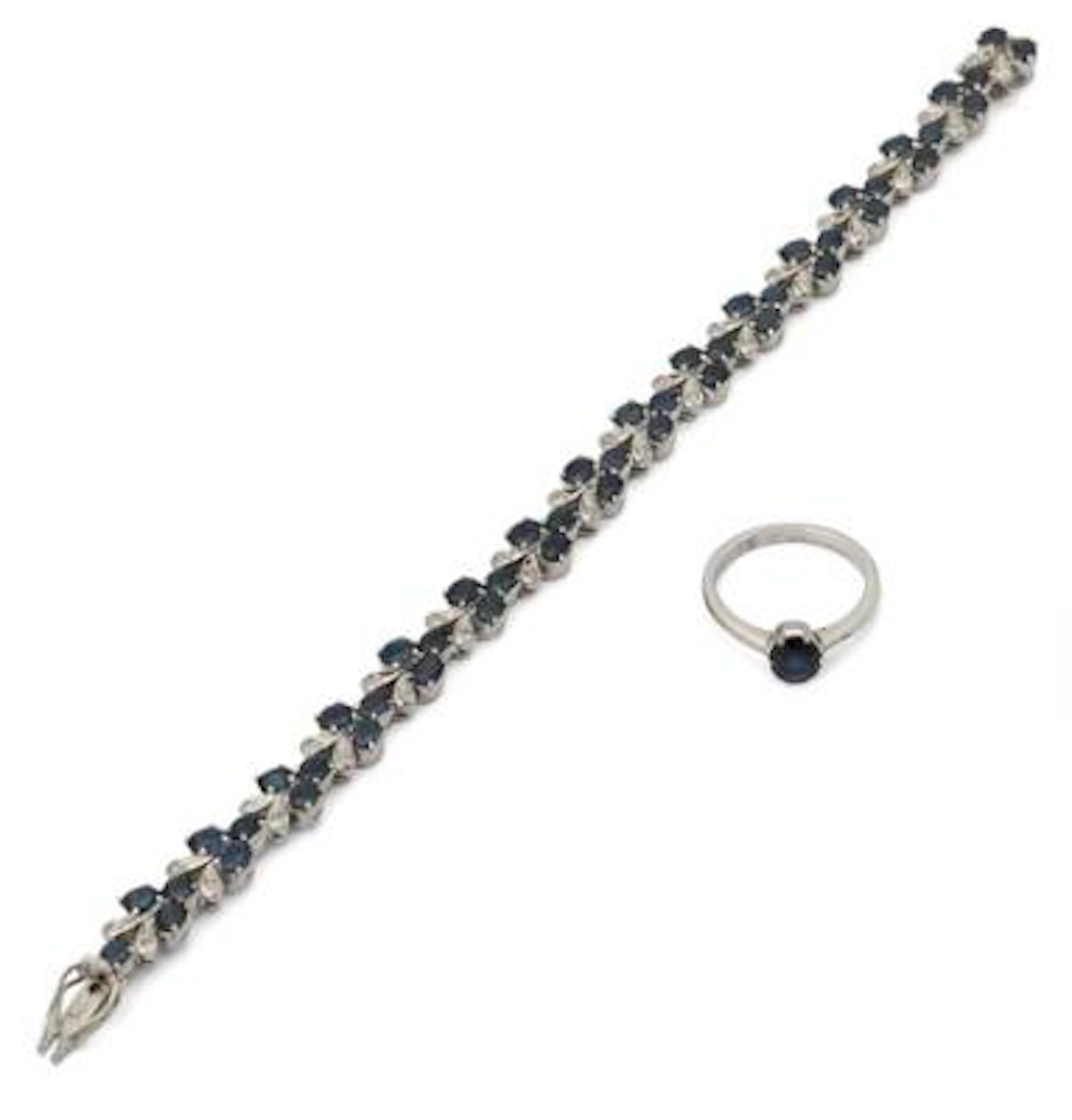 A sapphire bracelet and a ring set with sapphires and cubic zirkon