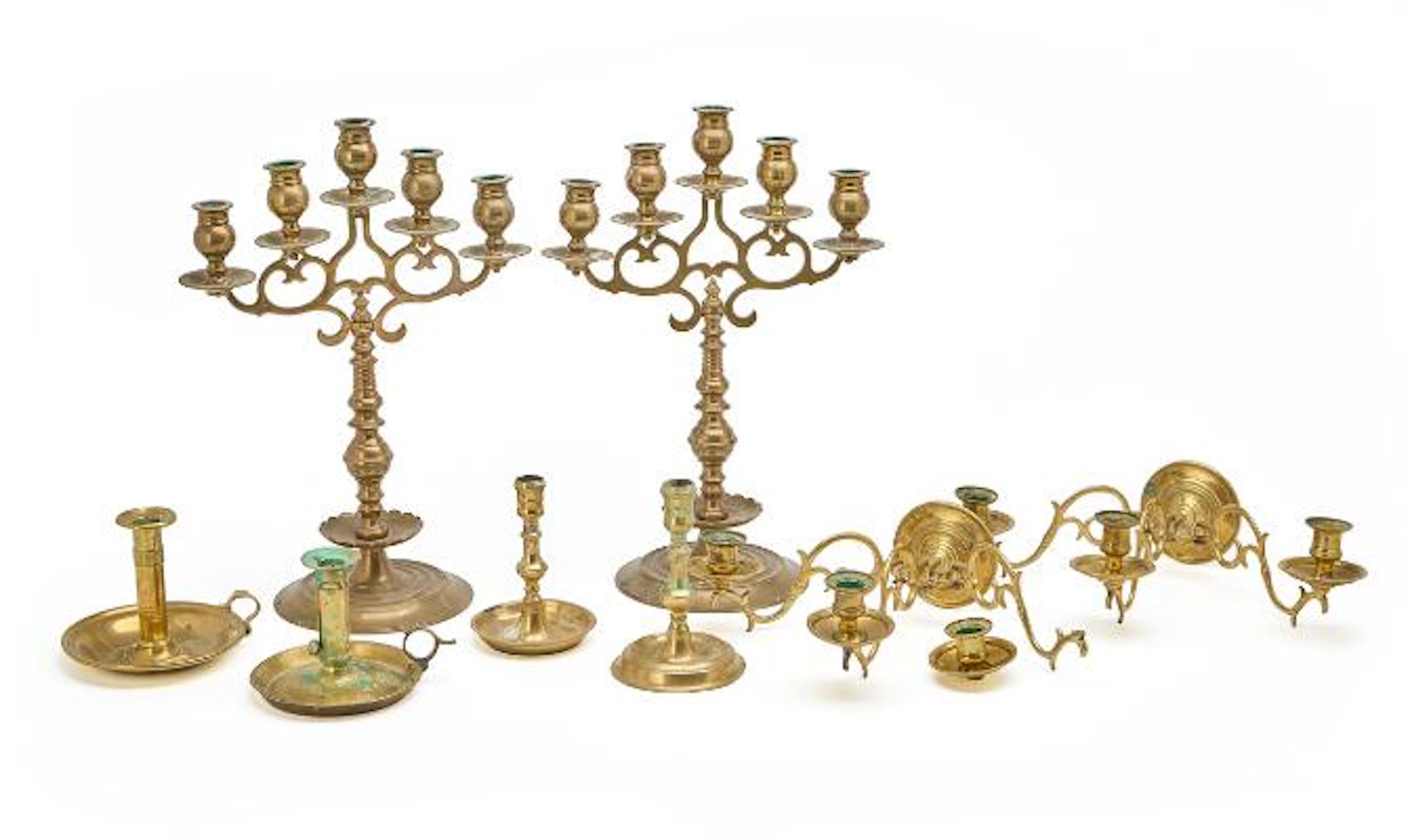 A pair of five-armed candelabra in bronze, a pair of wall lights and