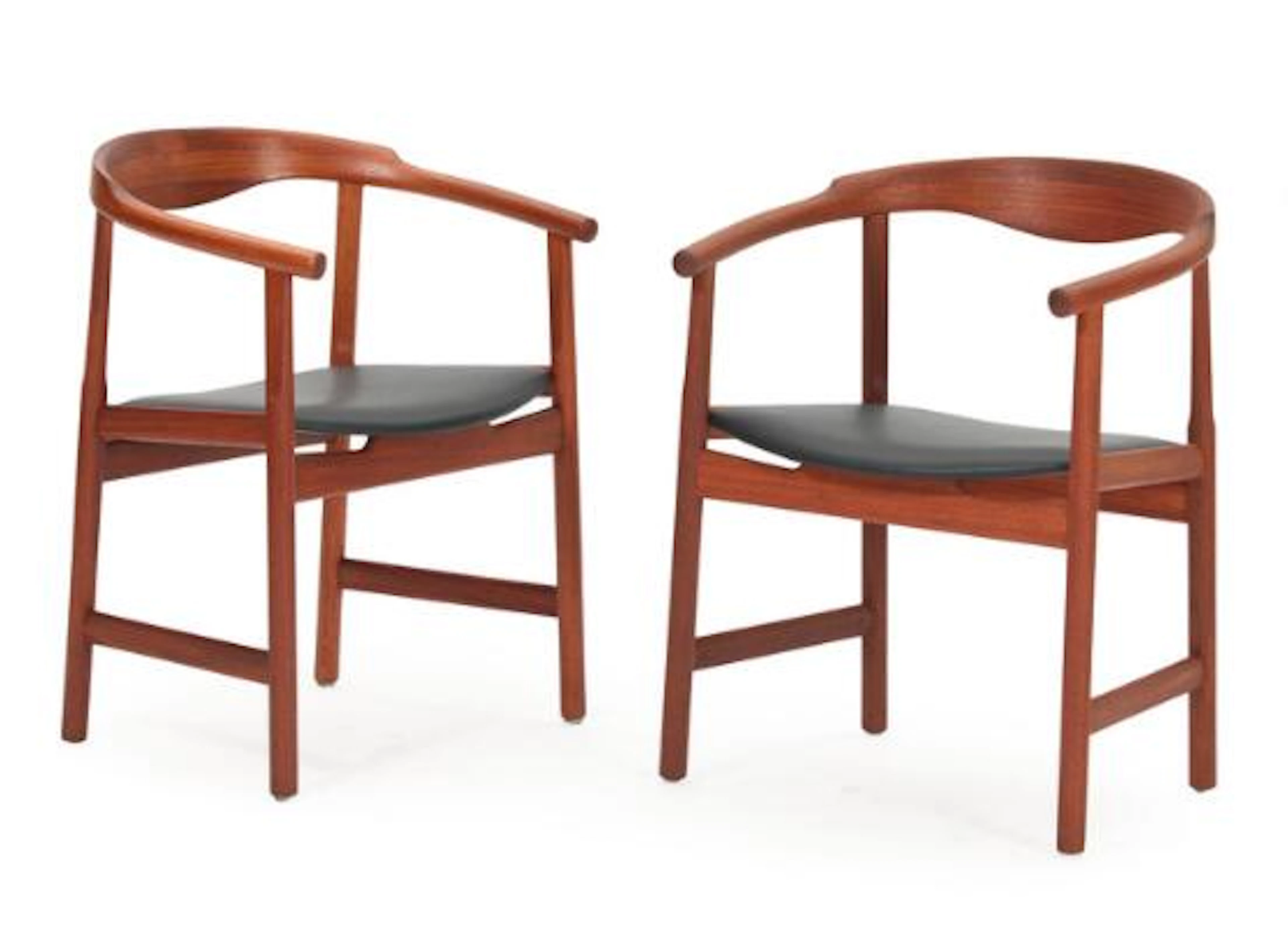 Hans J. Wegner: "Schæffergården". A pair of mahogany armchairs, upholstered