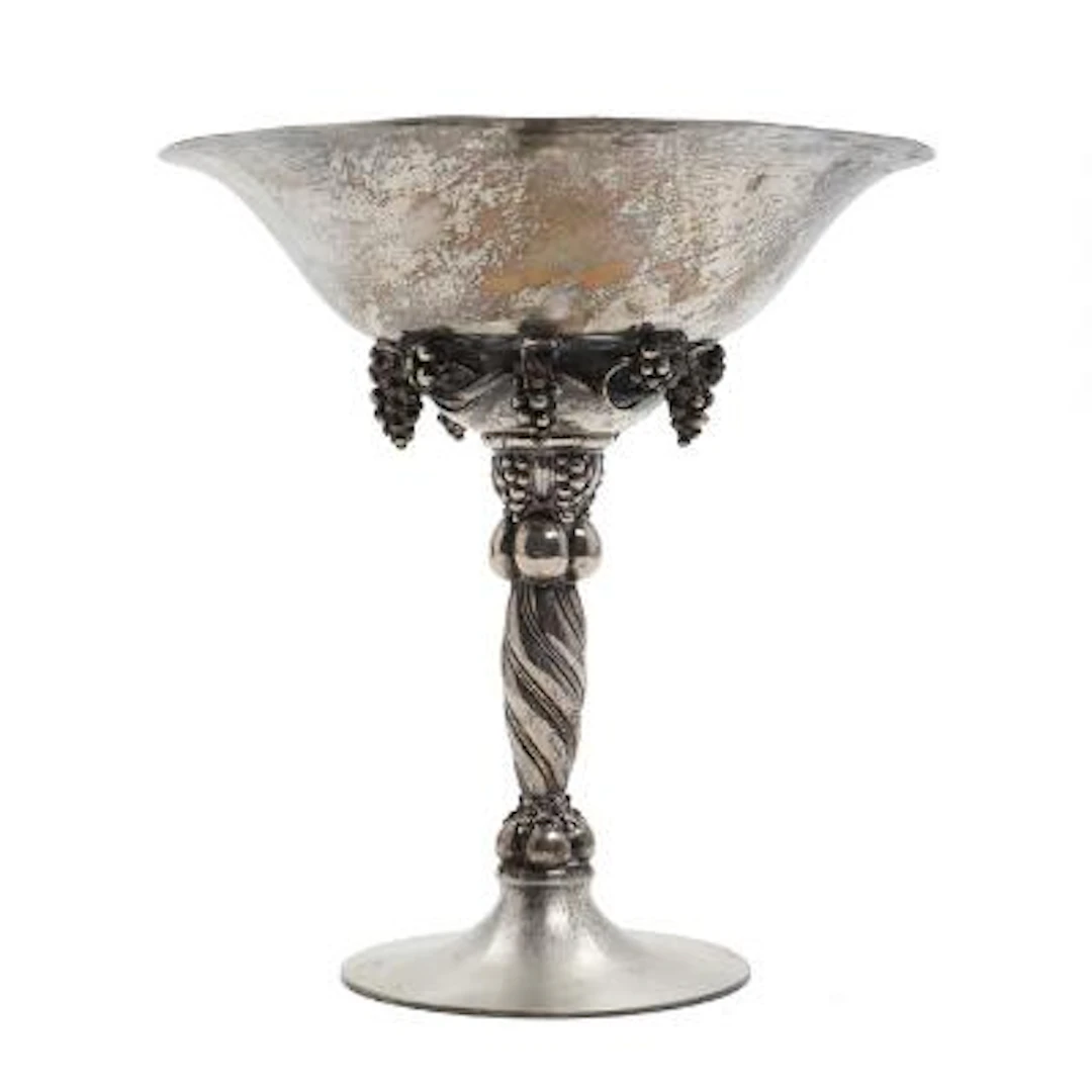 Georg Jensen: A large sterling silver tazza with grapes. Spiral fluted