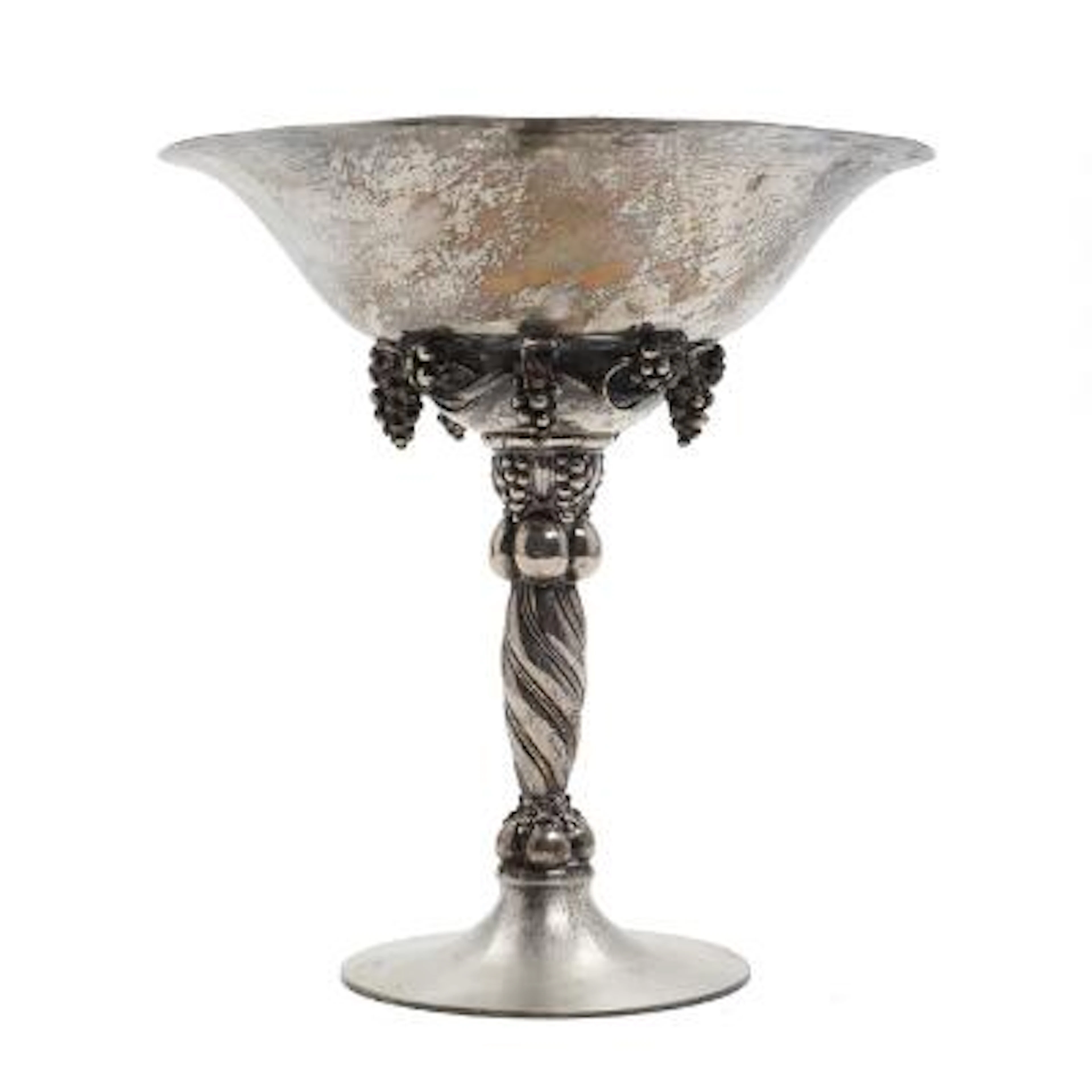 Georg Jensen: A large sterling silver tazza with grapes. Spiral fluted