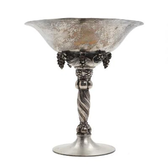 Georg Jensen: A large sterling silver tazza with grapes. Spiral fluted
