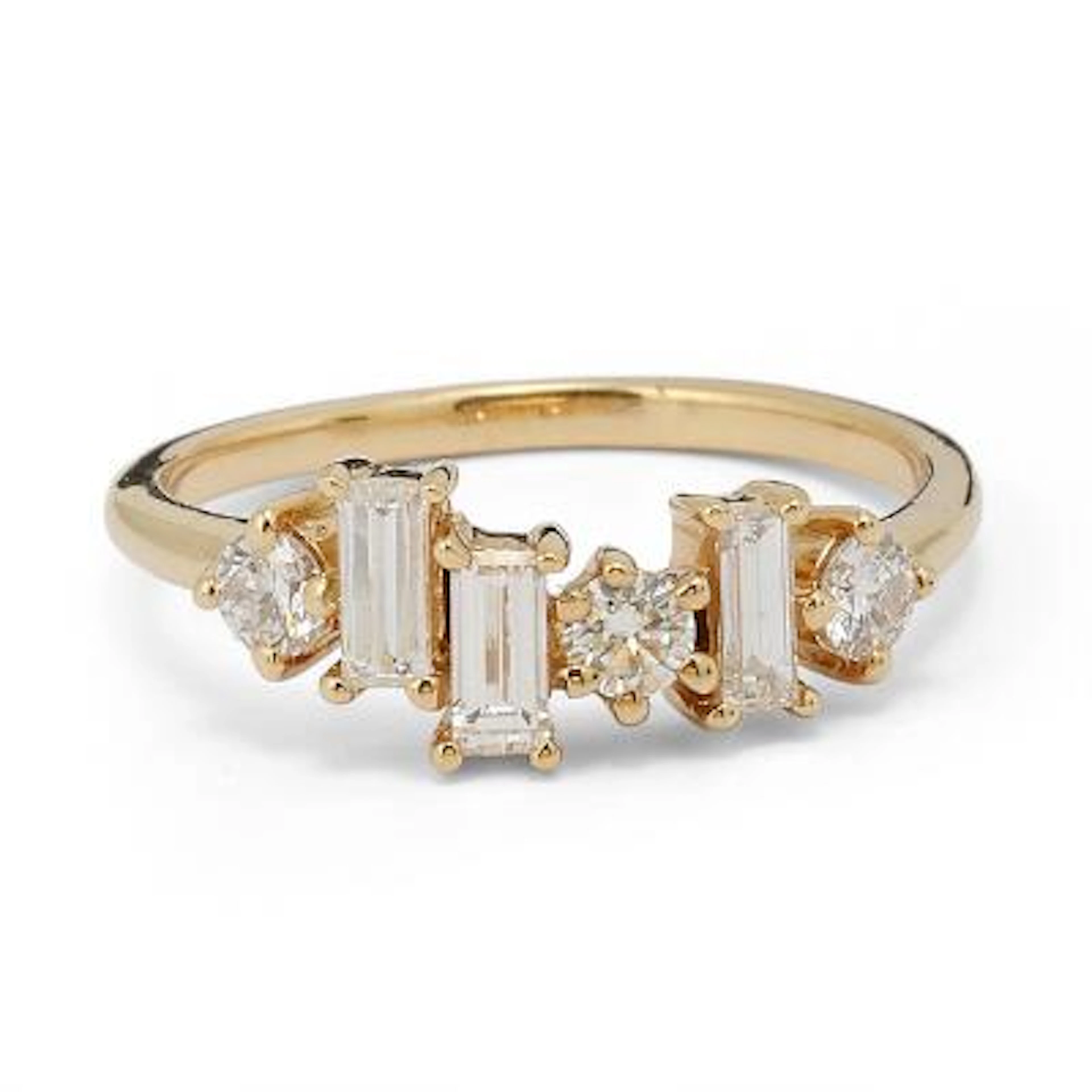A diamond ring set with six diamonds mounted in 18k gold. Weight in