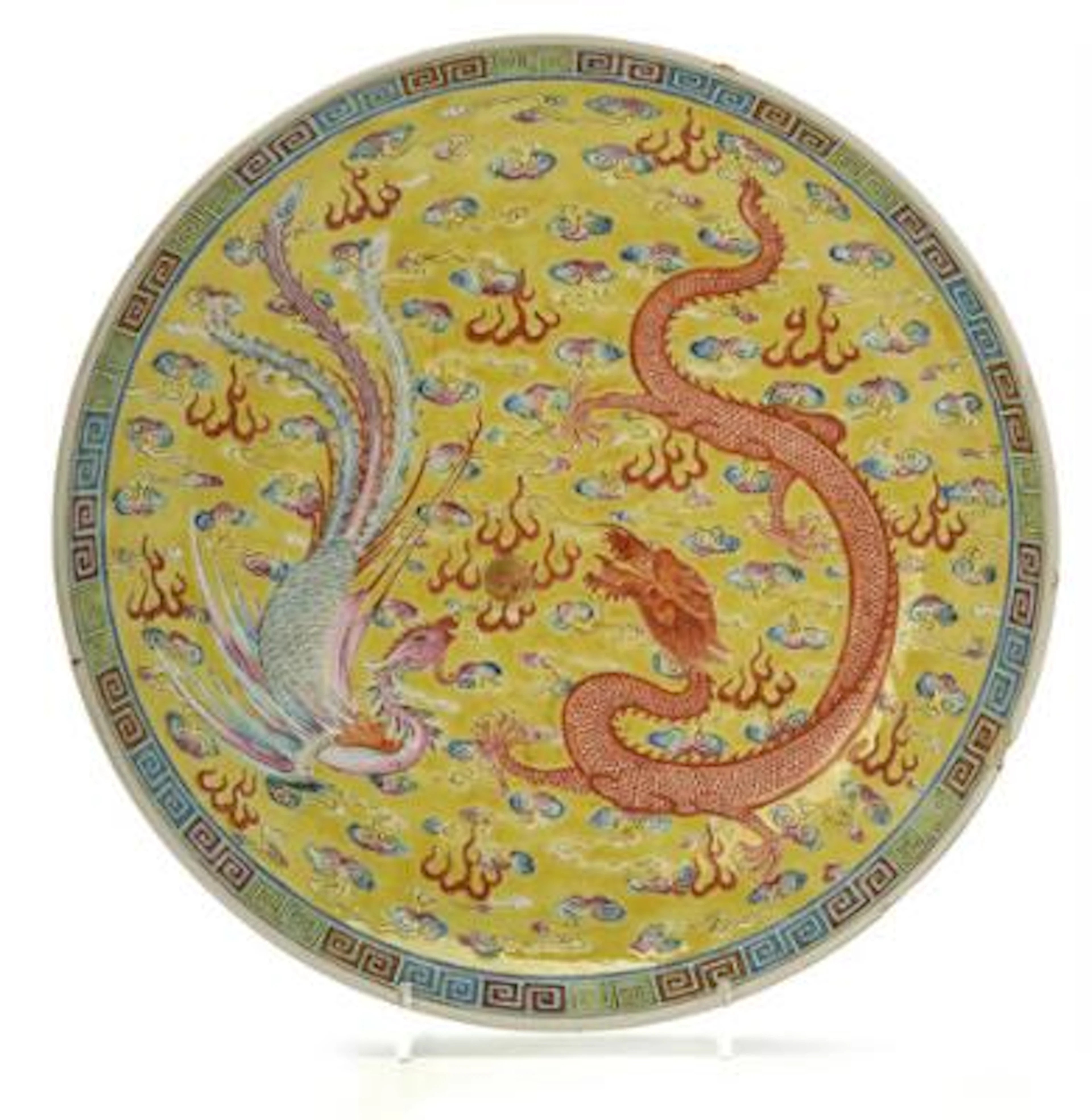 A Chinese porcelain dish with dragon and phoenix. Guangxu 1875-1908.