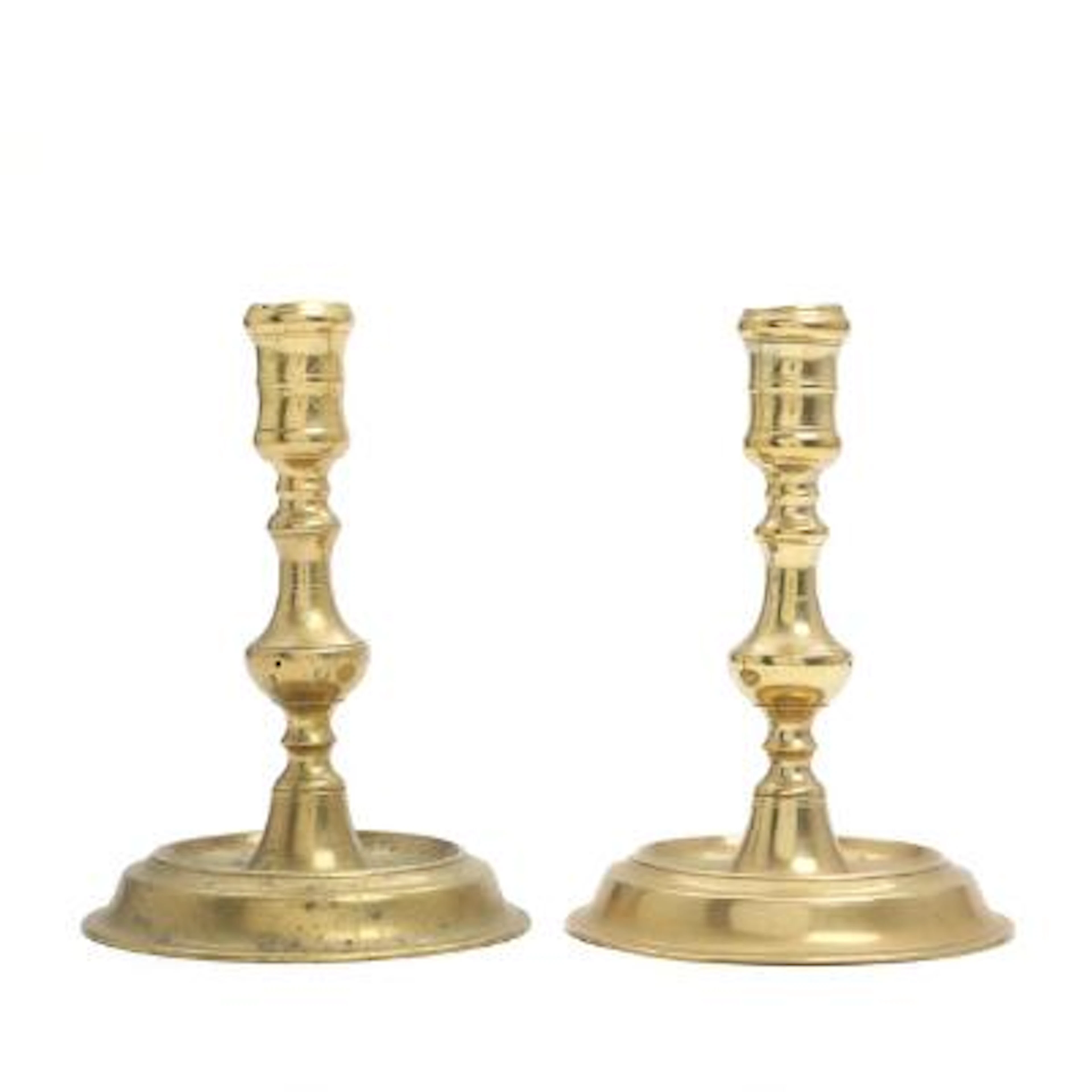 A pair of almost identical 18th century Danish brass candlesticks.