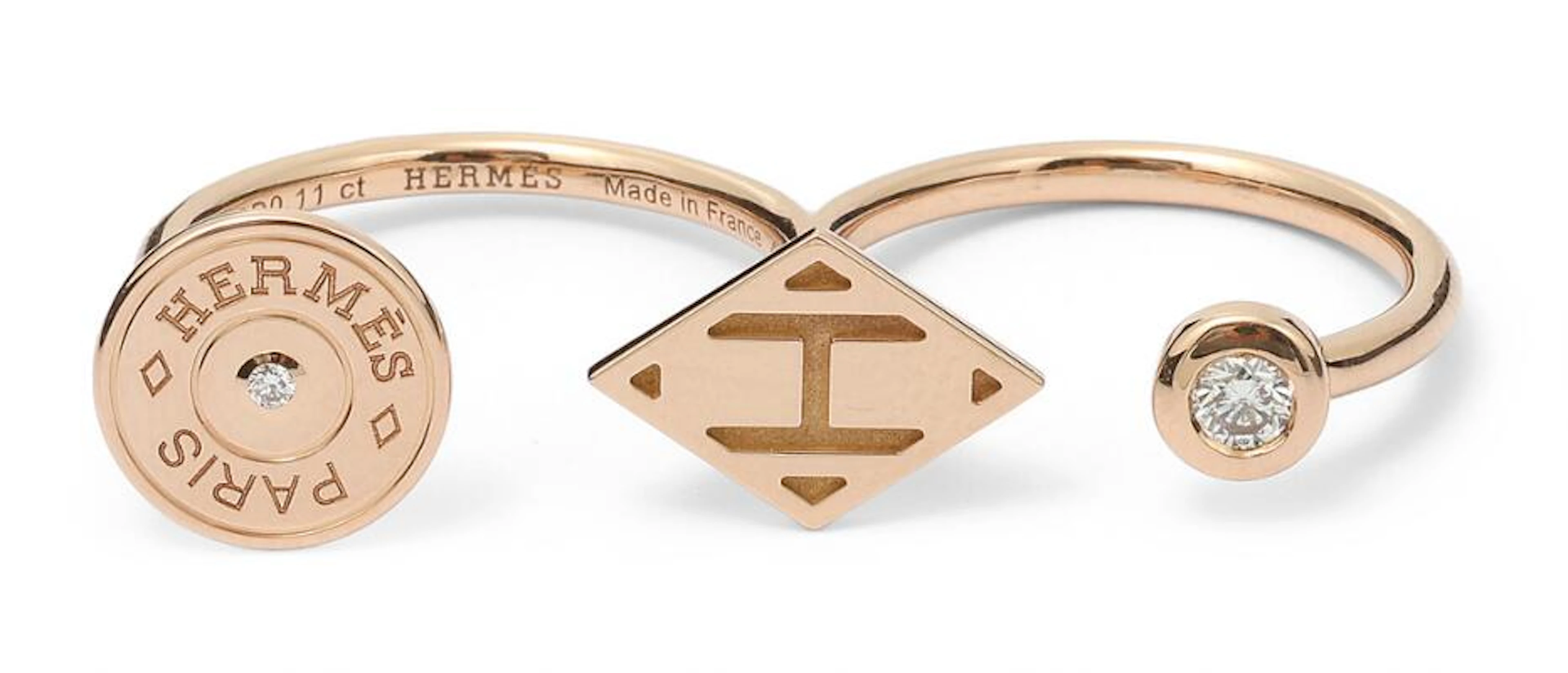 Hermès: A "Gambade" double ring set with two brilliant-cut diamonds